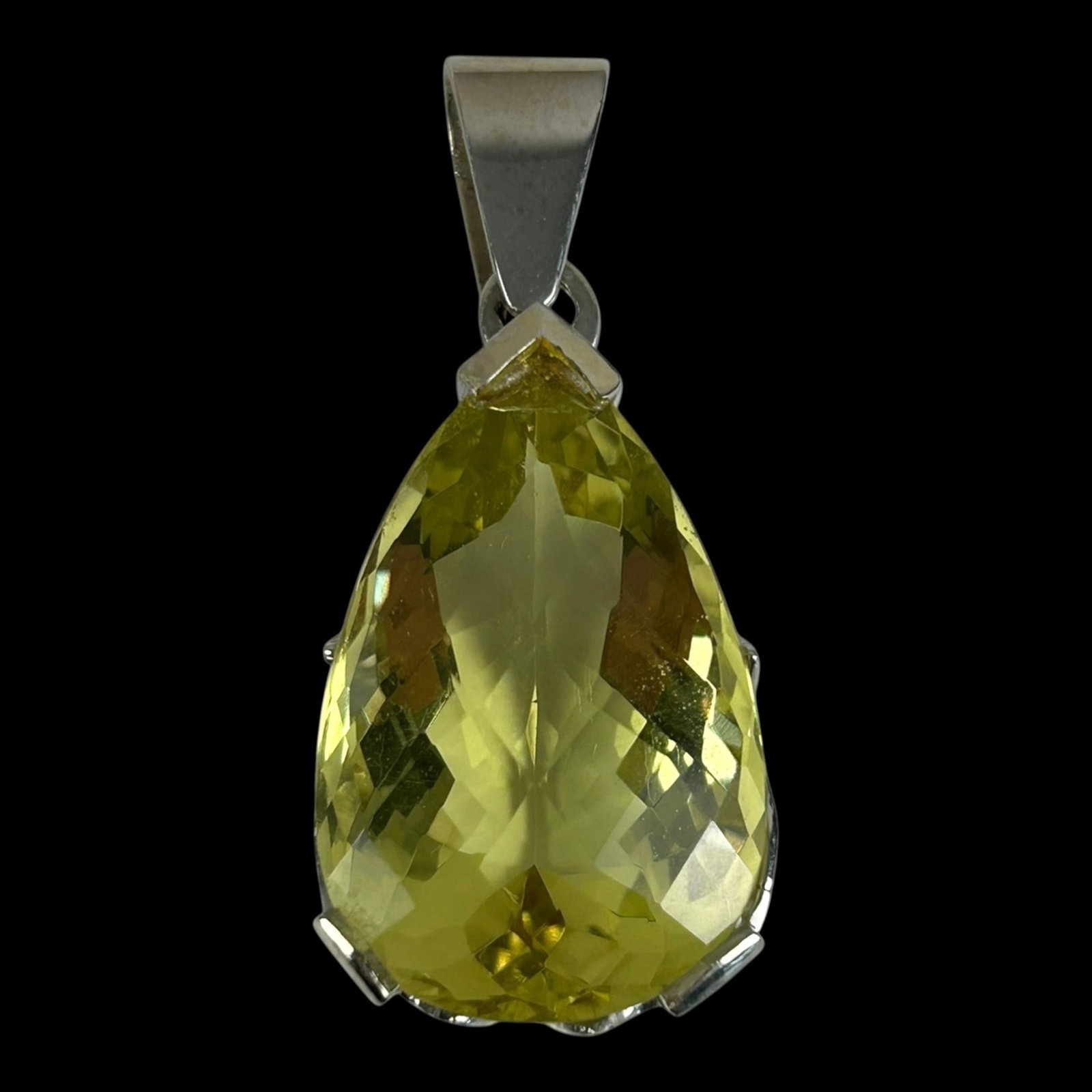 Radiant 48ct Lime Quartz Teardrop Stone In Large 14 Grams 14K White Gold Lotus Flower Mounted Slide: Professional, fast, and affordable in house shipping available for all items.For higher resolution images please visit bid.craftedauctions.com Radiant 48ct Lime Quartz Teardrop Stone In Large 14 Grams