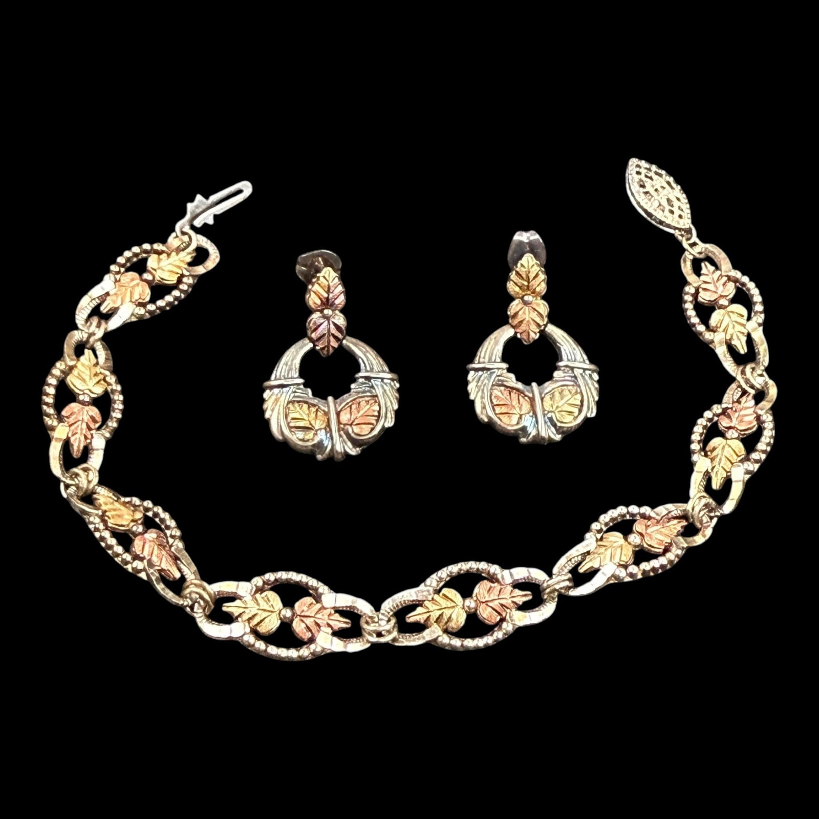Coleman Co. Black Hills 12K Gold & Sterling Silver Ornate Leaf Panel Design Earrings & Bracelet: Professional, fast, and affordable in house shipping available for all items.For higher resolution images please visit bid.craftedauctions.com Coleman Co. Black Hills 12K Gold & Sterling Silver Ornate