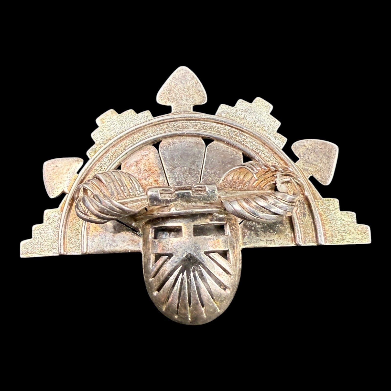 Sterling Silver 925 Southwest Figural Kachina Sunface Brooch Pin With Geometric Overlay Design: Professional, fast, and affordable in house shipping available for all items.For higher resolution images please visit bid.craftedauctions.com Distinctive sterling silver Southwest brooch combining a 
