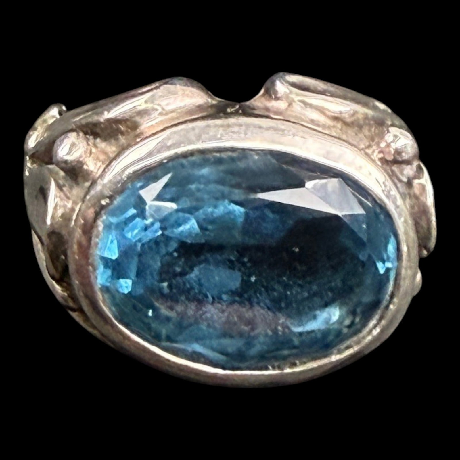 Sterling Silver Blue Topaz Ring With Large Oval Faceted Gemstone And Modernist Wide Band Design: Professional, fast, and affordable in house shipping available for all items.For higher resolution images please visit bid.craftedauctions.com Boldly styled, this sterling silver ring features a large