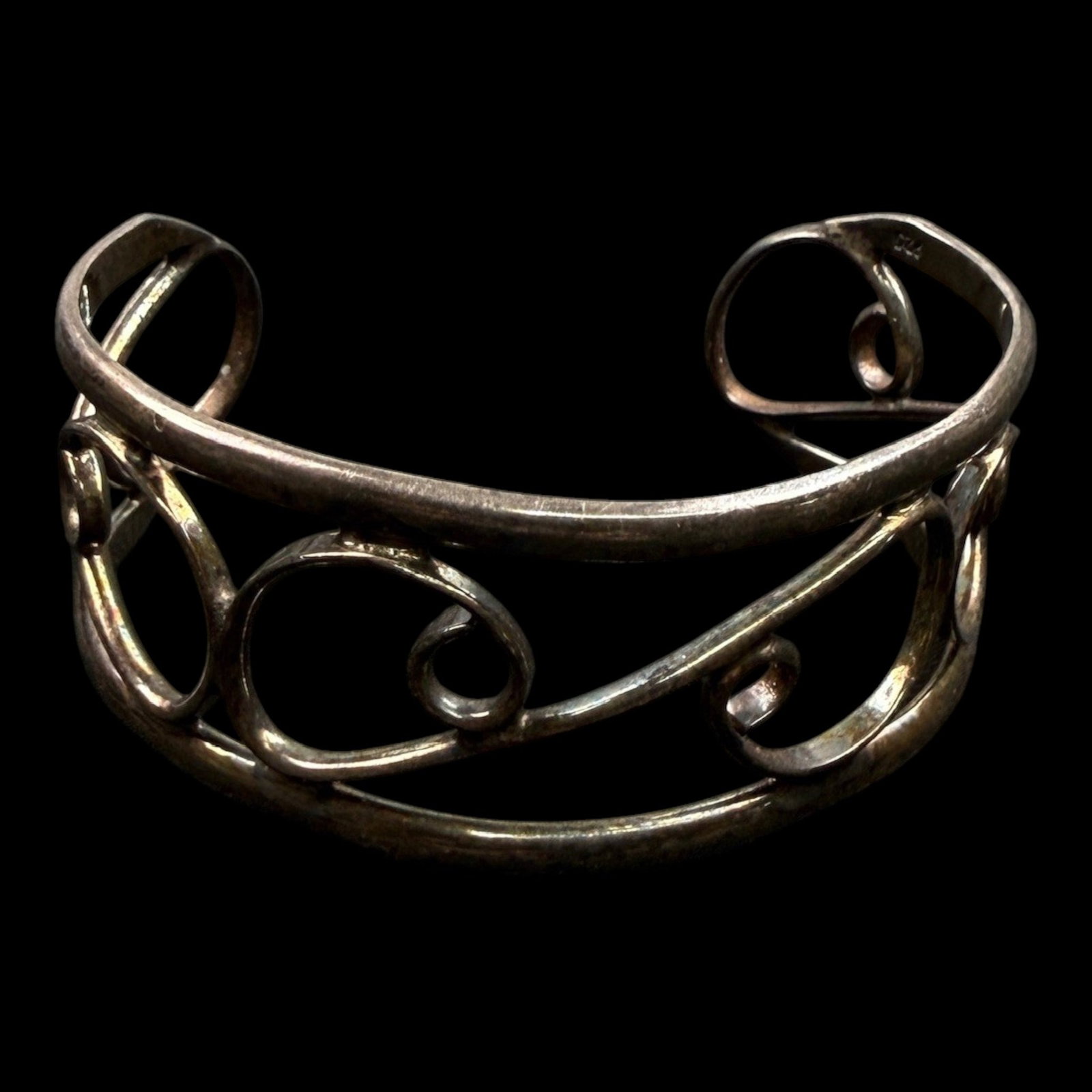 Sterling Silver Modernist Open Scroll Cuff Bracelet With Hand Forged Wirework Artisan Design: Professional, fast, and affordable in house shipping available for all items.For higher resolution images please visit bid.craftedauctions.com Gracefully handcrafted, this sterling silver cuff bracele