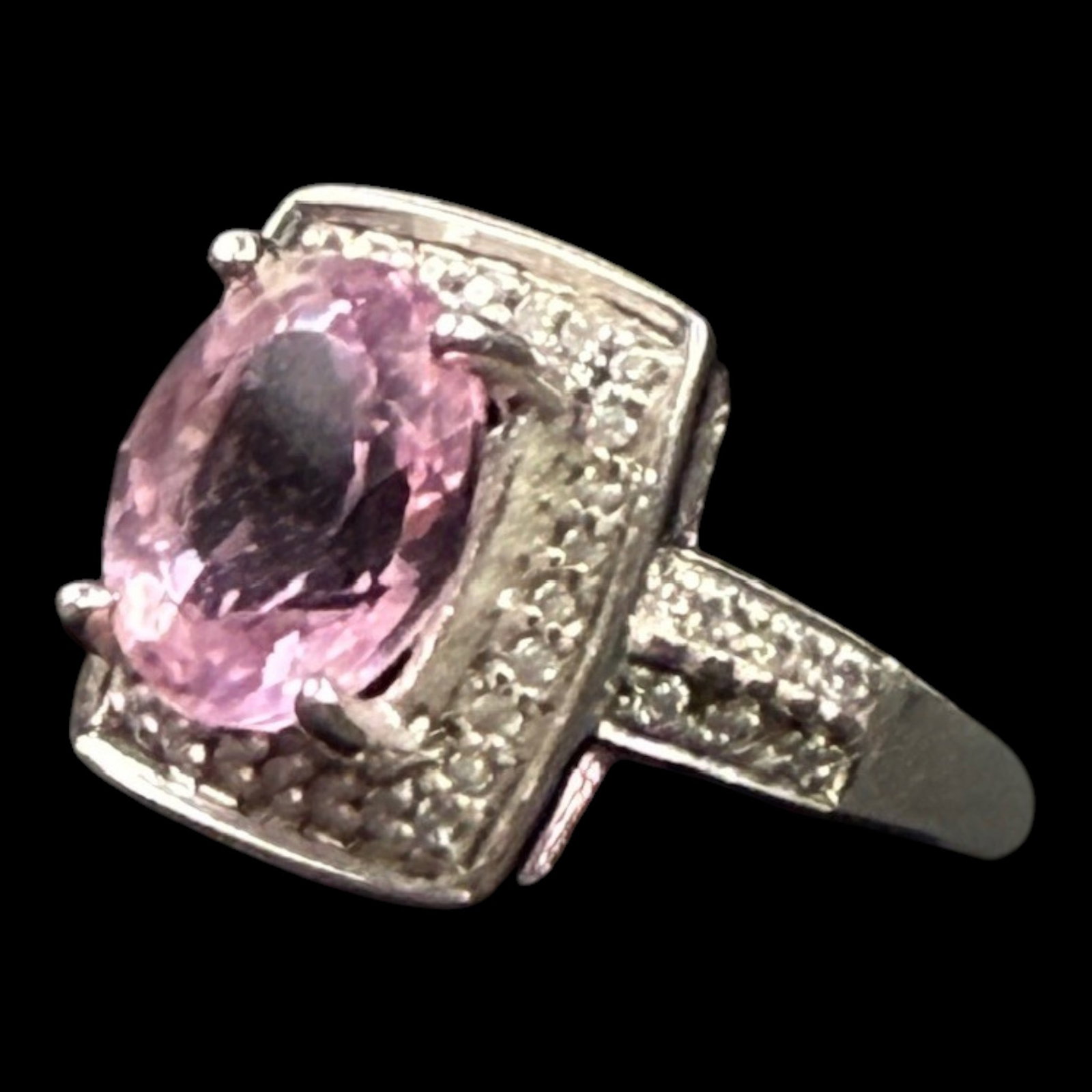 Sterling Silver Pink Tourmaline & CZ Ring With Oval Gemstone And Art Deco Style Halo Design: Professional, fast, and affordable in house shipping available for all items.For higher resolution images please visit bid.craftedauctions.com Elegantly crafted, this sterling silver ring features a l