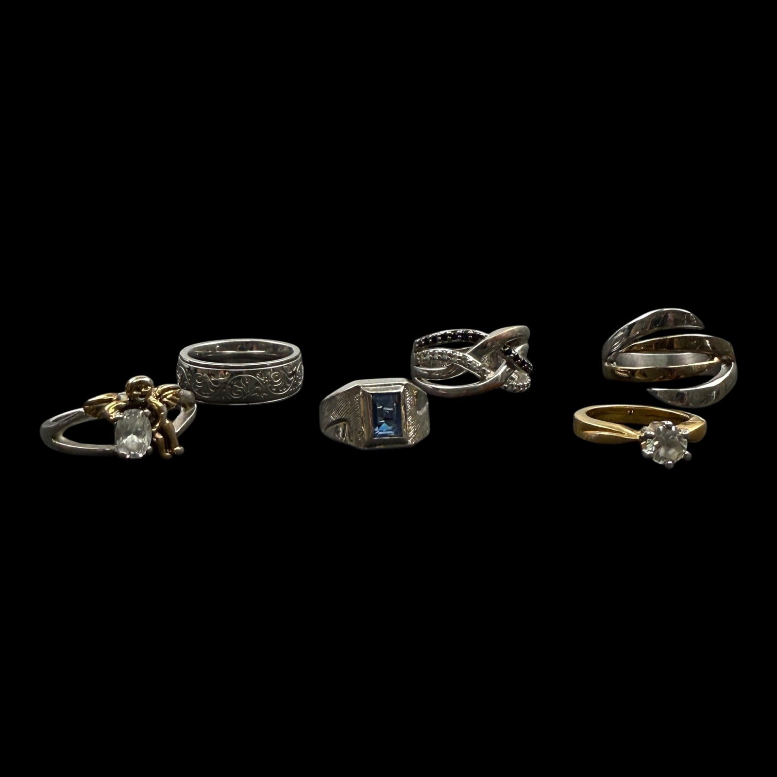 Fashion Ring Collection Cubic Zirconia Blue Stone Band Solitaire & Bypass Designs Mixed Metals: Professional, fast, and affordable in house shipping available for all items.For higher resolution images please visit bid.craftedauctions.com Fashion Ring Collection Cubic Zirconia Blue Stone Band So