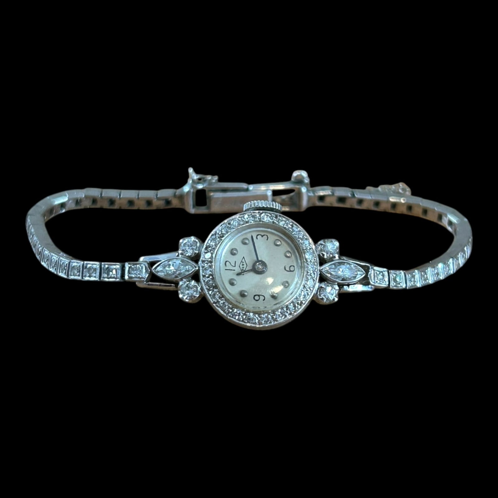 Pery Watch Co. Vintage Art Deco .900 Platinum & Diamond Case With 14K White Gold Diamond Band: Professional, fast, and affordable in house shipping available for all items.For higher resolution images please visit bid.craftedauctions.com Exquisitely glamorous and finely detailed, this Art Deco 