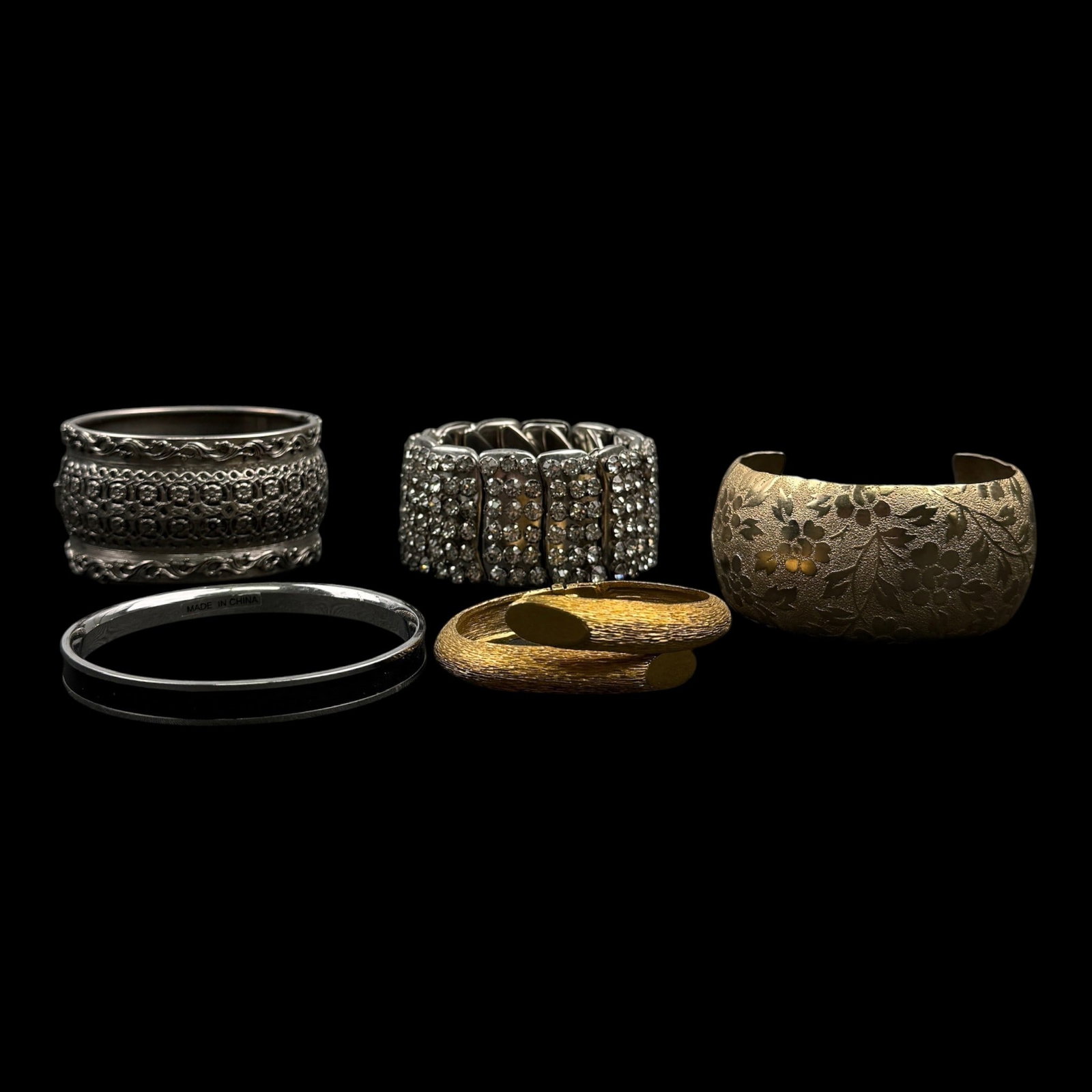 Trifari & Fashion Cuff Bracelet Collection Wide Openwork Twisted Bypass Mixed Metal Designs: Professional, fast, and affordable in house shipping available for all items.For higher resolution images please visit bid.craftedauctions.com Trifari & Fashion Cuff Bracelet Collection Wide Openwork 