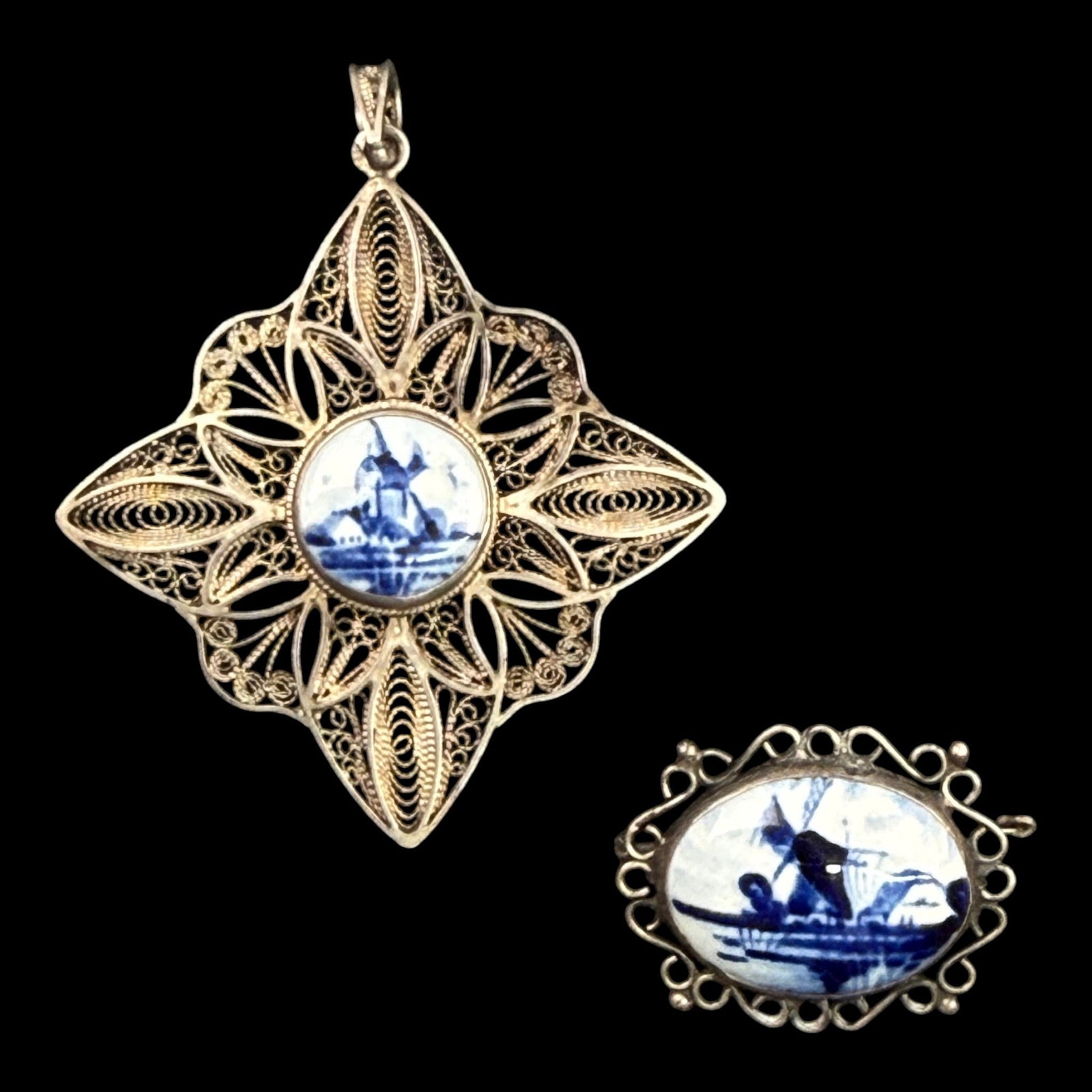 Early 20th Century Delft Sterling Silver Filigree Pendant & Brooch With Hand Painted Dutch Windmill: Professional, fast, and affordable in house shipping available for all items.For higher resolution images please visit bid.craftedauctions.com Finely crafted, this early 20th century sterling silver s