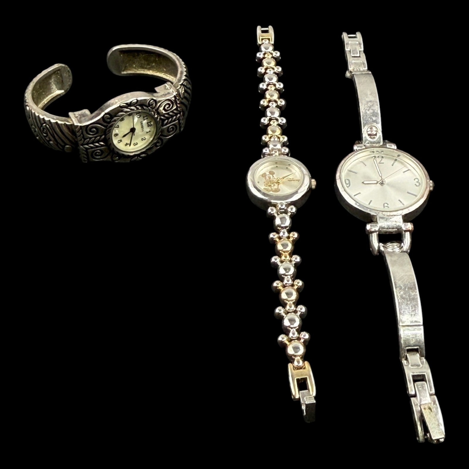 Walt Disney, Geneva, & Other Ladies Wristwatch Collection Cuff Link Bracelet Analog Watches: Professional, fast, and affordable in house shipping available for all items.For higher resolution images please visit bid.craftedauctions.com Walt Disney, Geneva, & Other Ladies Wristwatch Collection