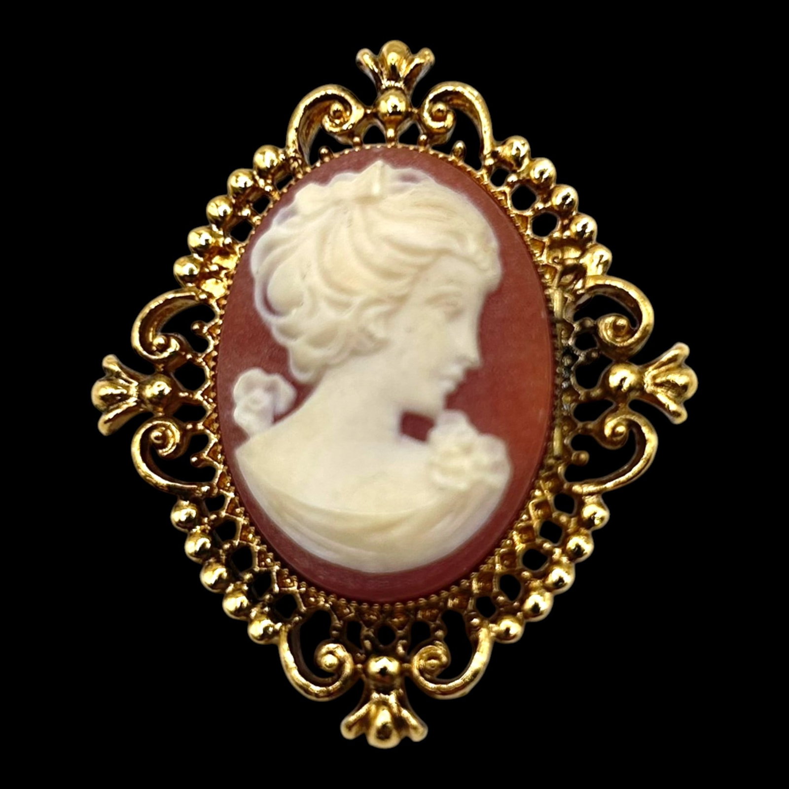 Gold Tone Filigree Cameo Portrait Brooch With Molded Resin Classical Lady Victorian Revival: Professional, fast, and affordable in house shipping available for all items.For higher resolution images please visit bid.craftedauctions.com Elegantly styled, this gold tone brooch features a molded
