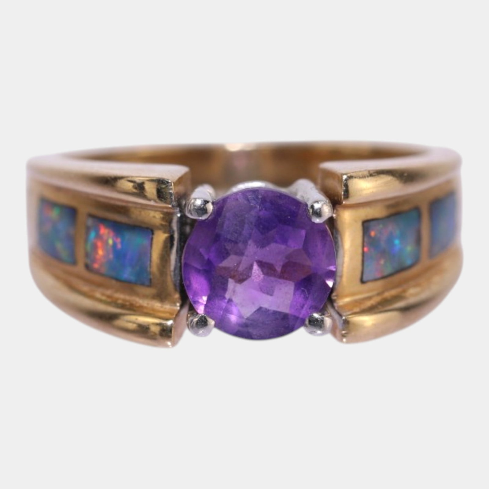 14K Yellow Gold, Amethyst Center Stone, And Opal Band Inlays Modernist Designer Ring Size 7: Professional, fast, and affordable in house shipping available for all items. For higher resolution images please visit bid.craftedauctions.com Boldly geometric and richly colored, this 14K gold desig