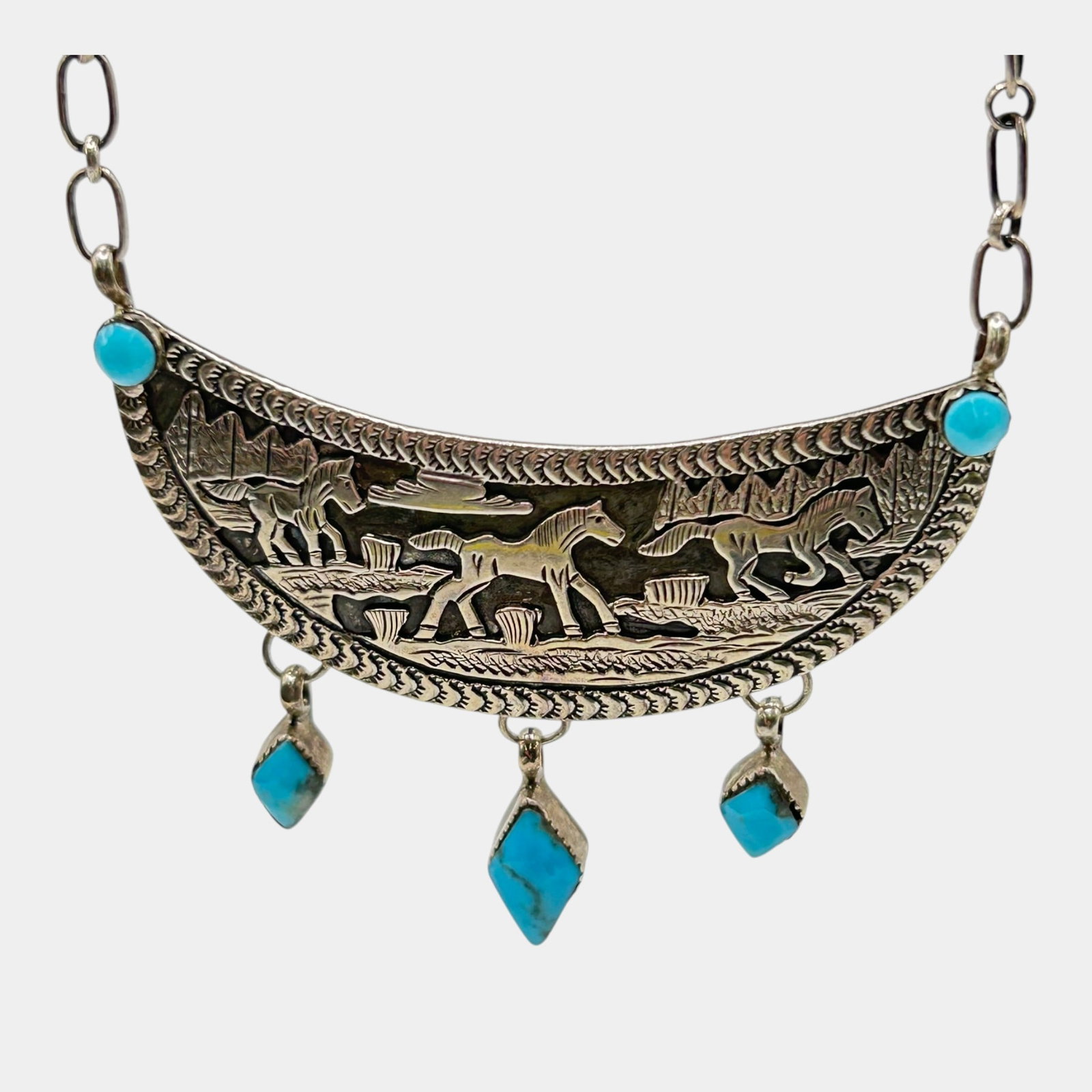 Running Bear Navajo Native American Sterling Silver 925 Turquoise Dangle Scenic Horse Motif Necklace: Professional, fast, and affordable in house shipping available for all items. For higher resolution images please visit bid.craftedauctions.com Boldly detailed, this Running Bear Navajo sterling silve