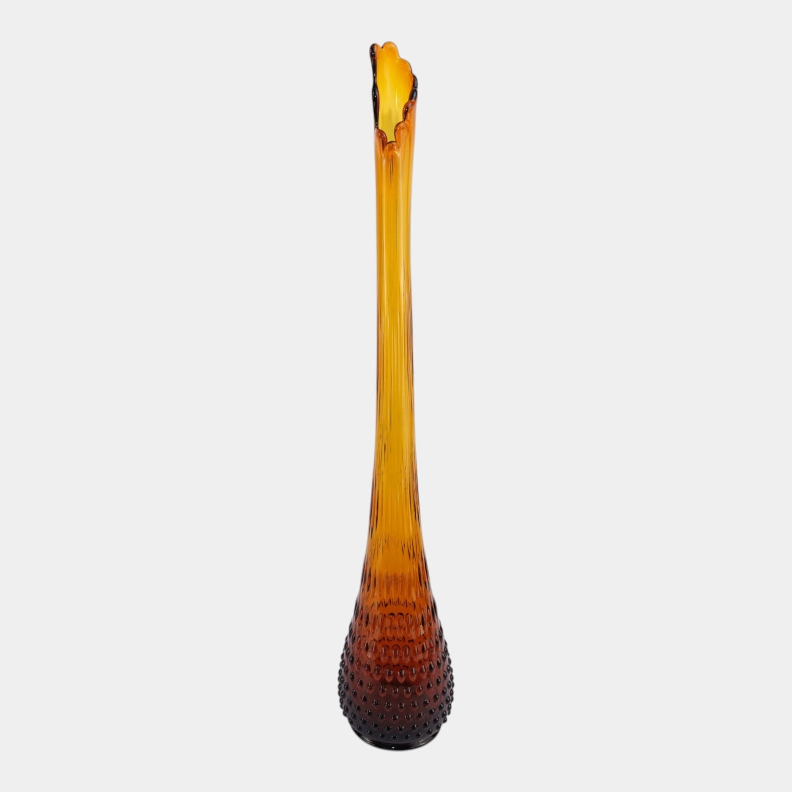 Mid Century Modern Tall 25" Amber Glass Swung Vase With Hobnail Body: Professional, fast, and affordable in house shipping available for all items. For higher resolution images please visit bid.craftedauctions.com Mid Century Modern Tall 25" Amber Glass Swung Vase With 