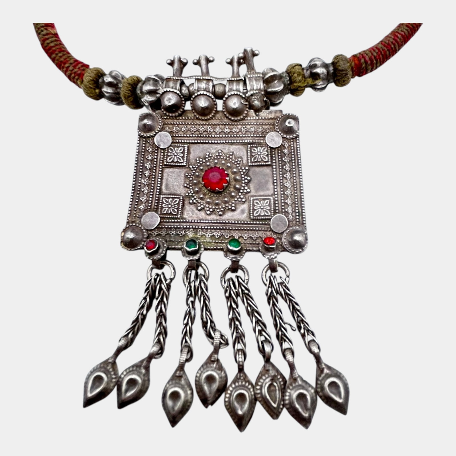 Middle Eastern Silver Tone Tribal Pendant Necklace With Dangles And Colored Stone Accents: Professional, fast, and affordable in house shipping available for all items. For higher resolution images please visit bid.craftedauctions.com Intricately crafted, this tribal-style necklace features