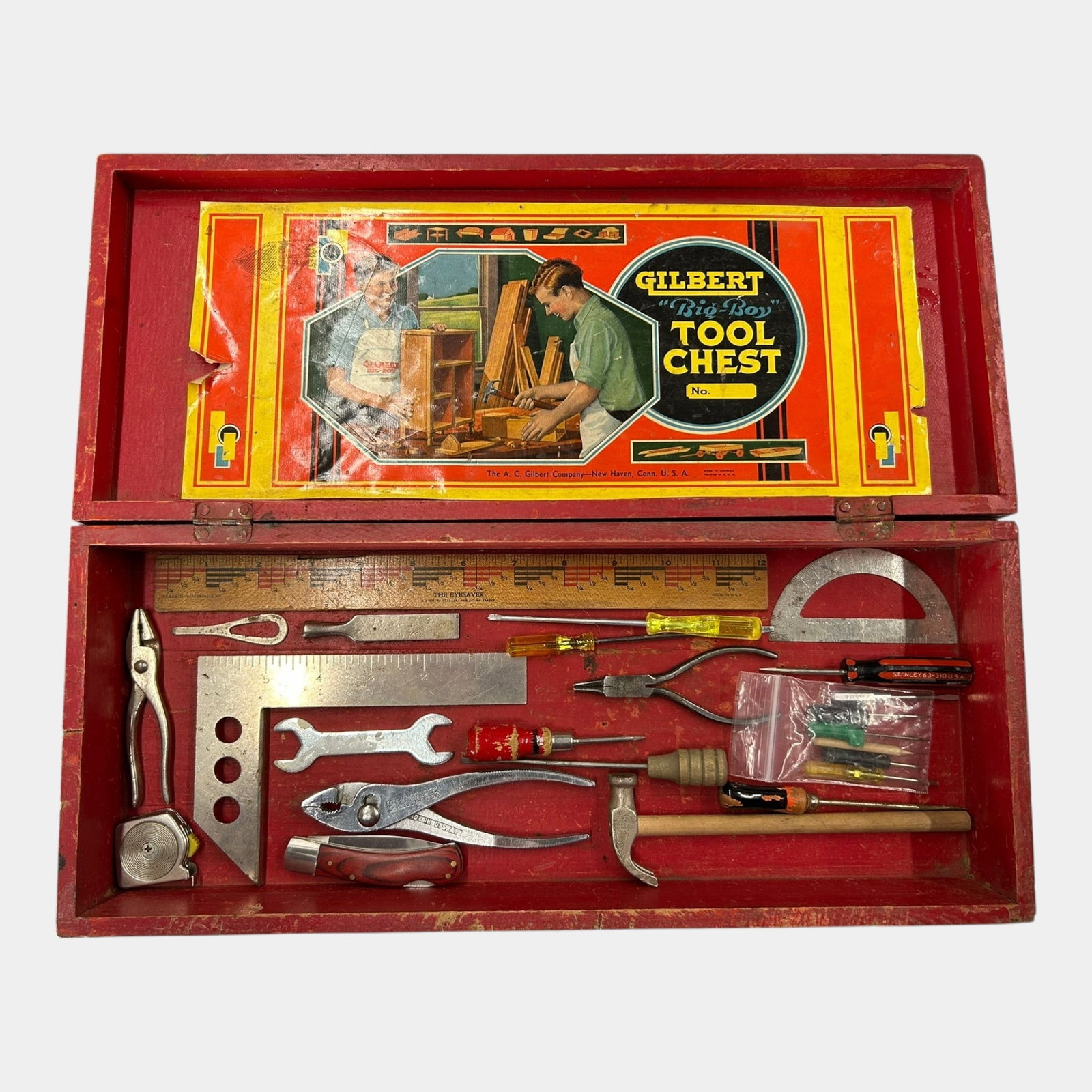 A.C. Gilbert 1950s Red Tin Case "Big Boy" Tool Chest With Miniature Tools And Rulers: Professional, fast, and affordable in house shipping available for all items. For higher resolution images please visit bid.craftedauctions.com A.C. Gilbert 1950s Red Tin Case "Big Boy" Tool Chest Wit