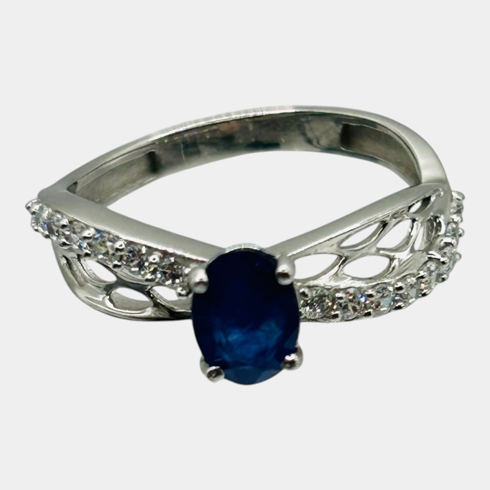 Sterling Silver 925 Oval Sapphire And Clear Stone Openwork Filigree Ring Size 7: Professional, fast, and affordable in house shipping available for all items. For higher resolution images please visit bid.craftedauctions.com Elegantly designed, this sterling silver ring features a