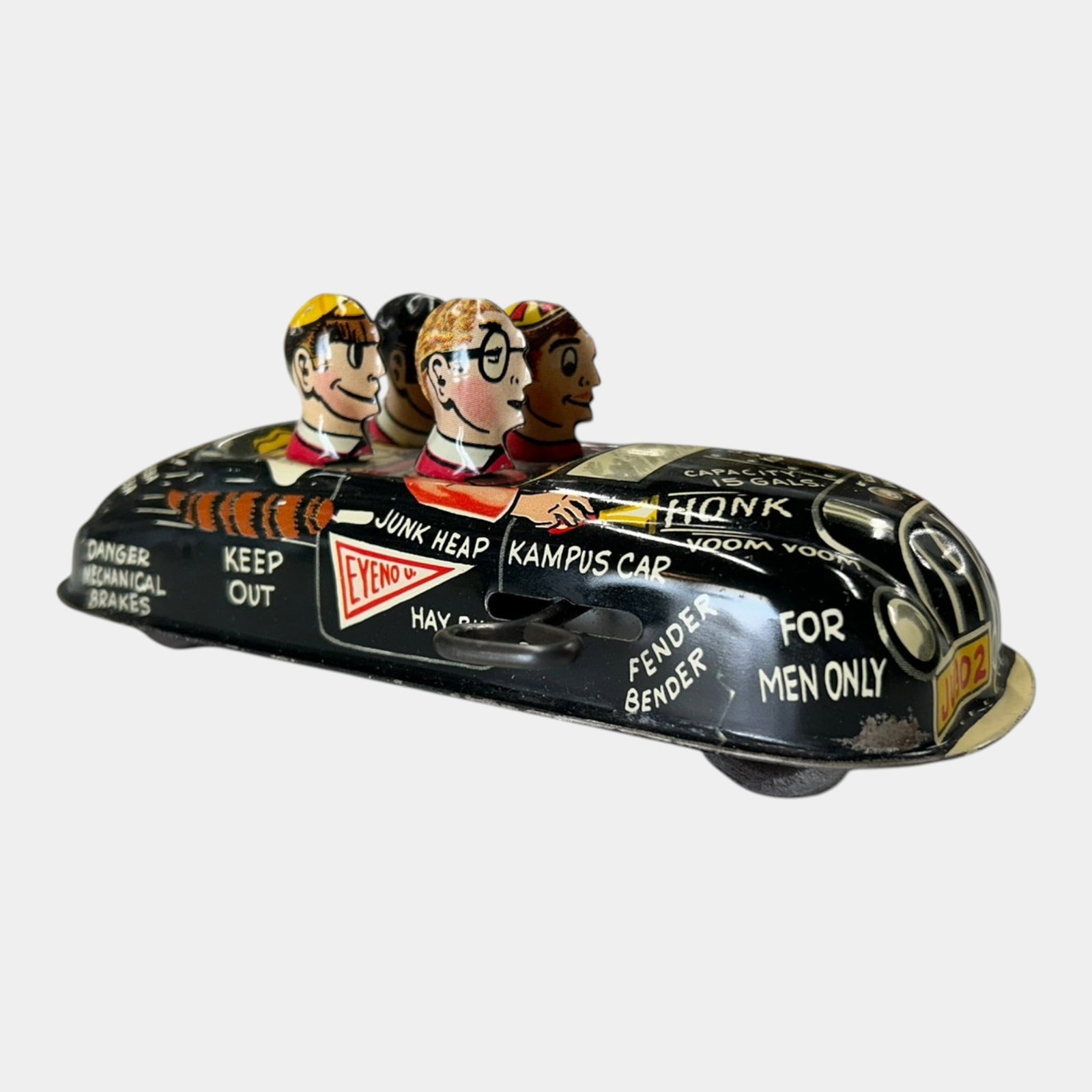 Louis Marx & Co. 1950s Tin Lithographed Kampus Car Jumping Jalopy Wind-Up Toy Car: Professional, fast, and affordable in house shipping available for all items. For higher resolution images please visit bid.craftedauctions.com Louis Marx & Co. 1950s Tin Lithographed Kampus Car Jumpi
