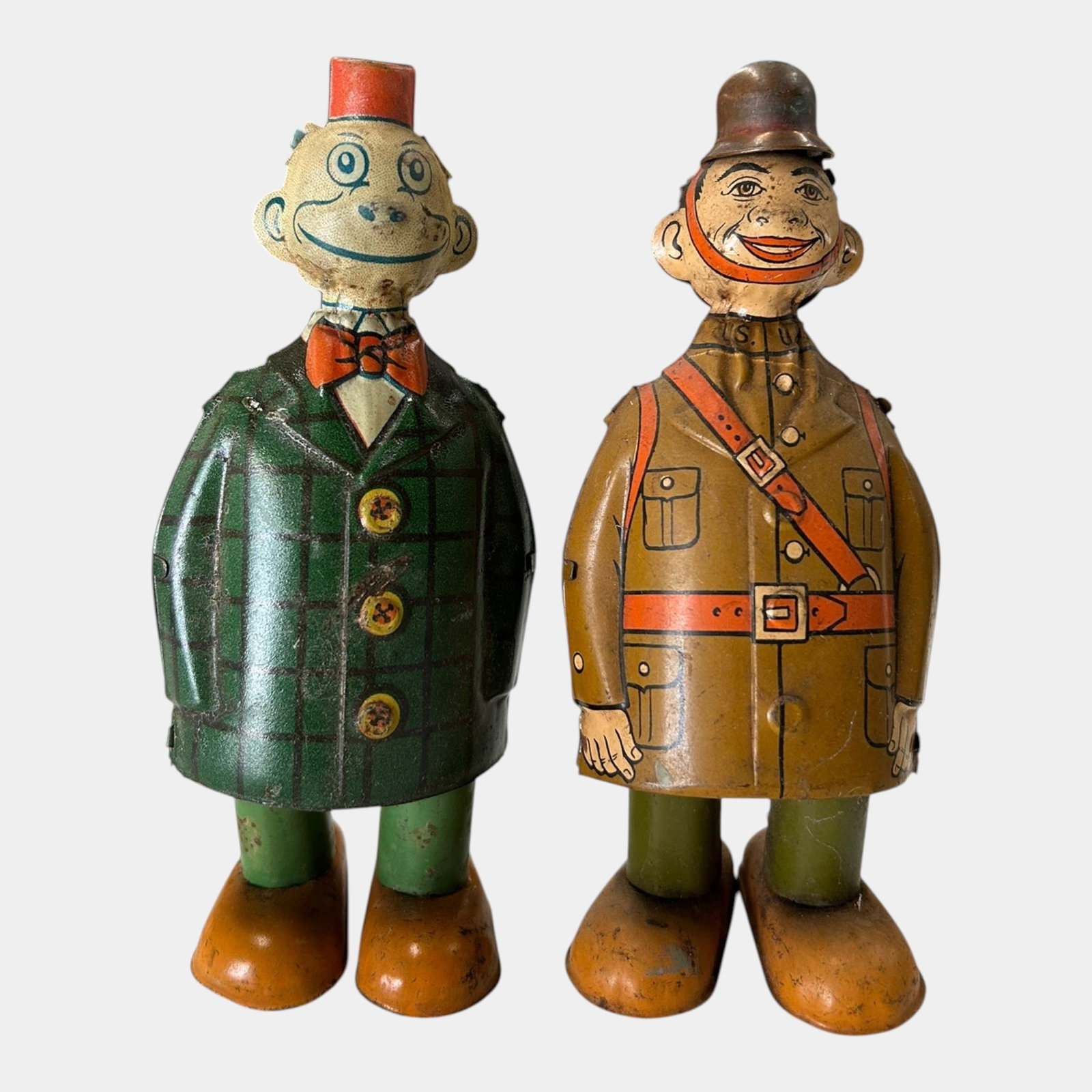 J. Chein & Co. 1930s Tin Lithographed Wind-Up Happy Hooligan & Doughboy Walking Toys: Professional, fast, and affordable in house shipping available for all items. For higher resolution images please visit bid.craftedauctions.com J. Chein & Co. 1930s Tin Lithographed Wind-Up Happy Hool