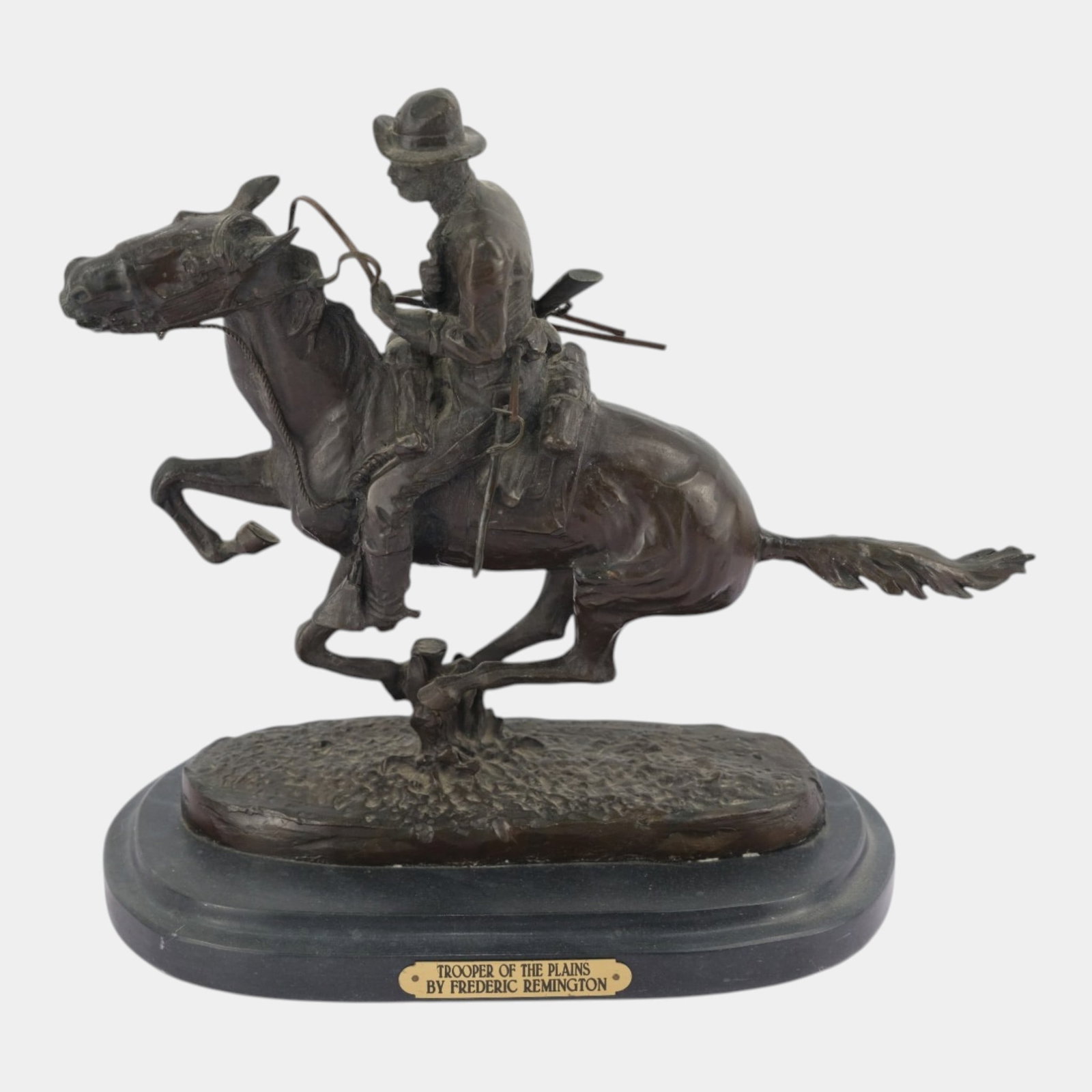 After Frederic Remington (American, 1861-1909) Trooper Of The Plains Bronze Sculpture: Professional, fast, and affordable in house shipping available for all items. For higher resolution images please visit bid.craftedauctions.com After Frederic Remington (American, 1861-1909) Trooper O
