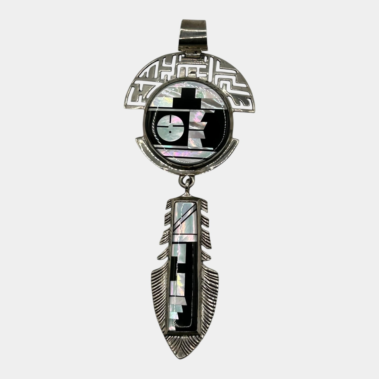 Alvin Yellowhorse Navajo Native American Sterling Silver Inlay Stone Kachina Dangle Slide Pendant: Professional, fast, and affordable in house shipping available for all items. For higher resolution images please visit bid.craftedauctions.com Strikingly geometric, this Alvin Yellowhorse Navajo ster