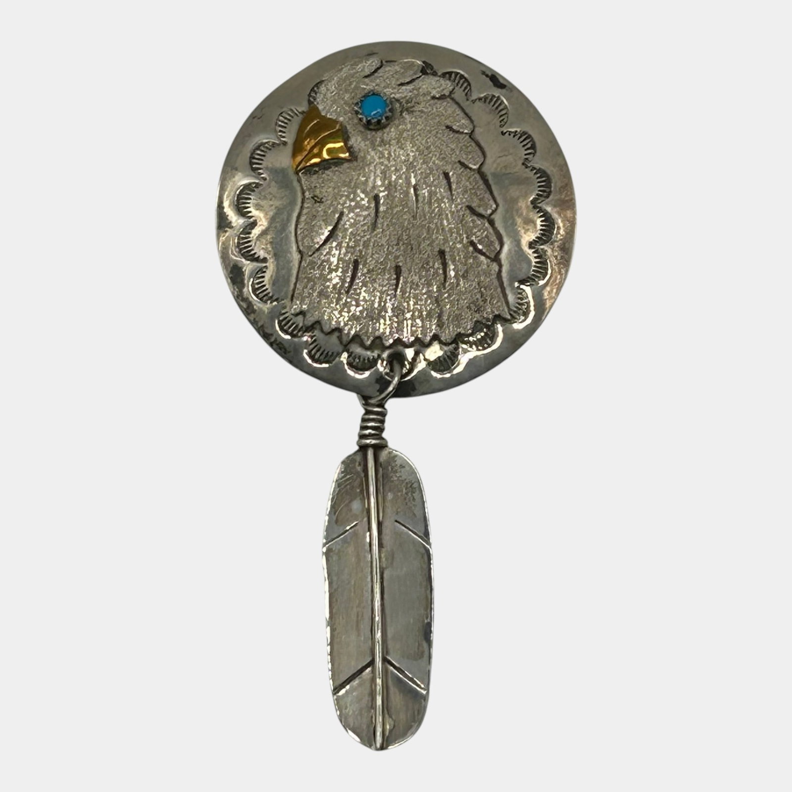Native American Sterling Silver 925 Turquoise Eagle Feather Dangle Brooch Pendant Artist Signed: Professional, fast, and affordable in house shipping available for all items. For higher resolution images please visit bid.craftedauctions.com Boldly crafted, this Native American sterling silver bro