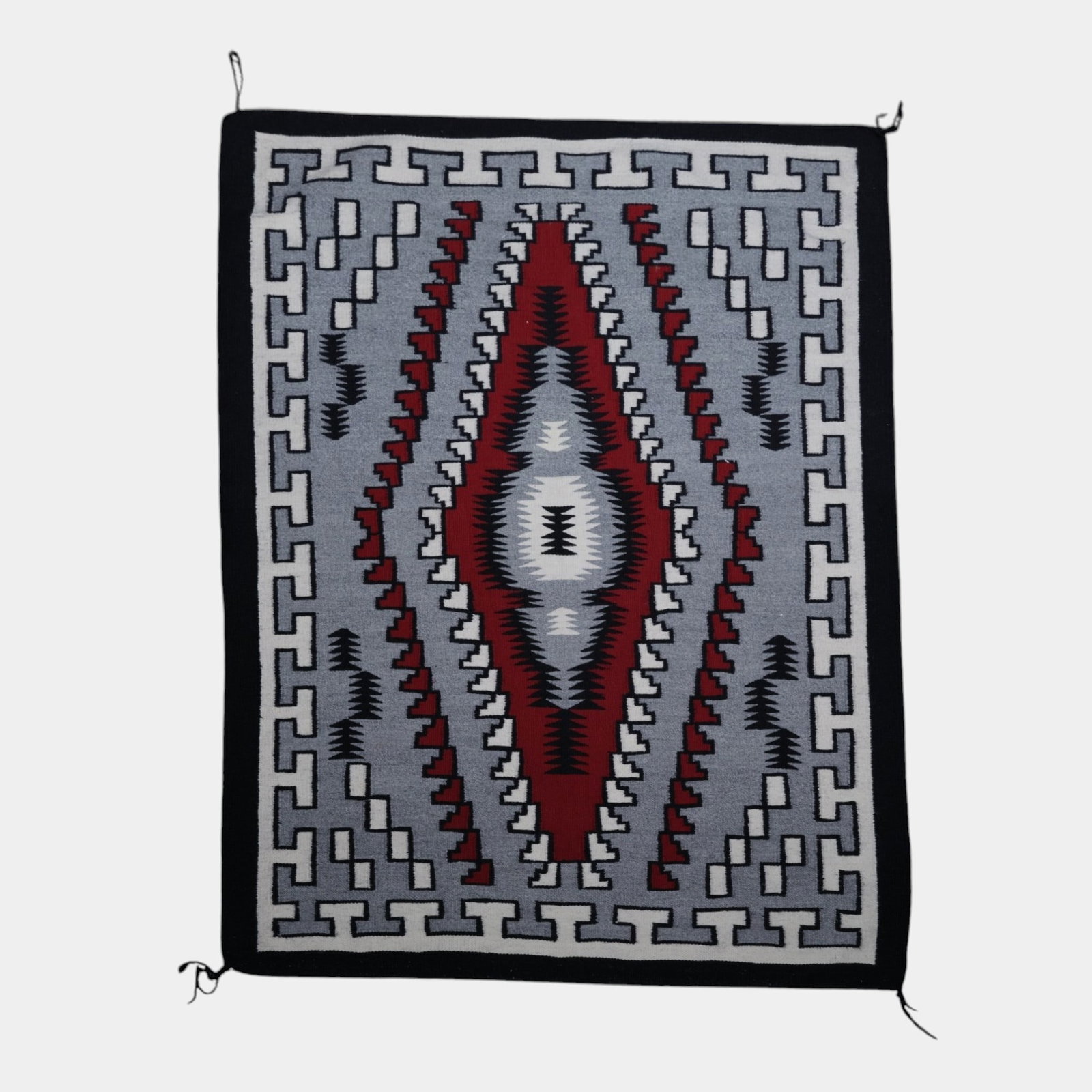 Large Vintage Navajo Ganado Dine Handwoven Wool Rug With Bold Diamond Medallion Design: Professional, fast, and affordable in house shipping available for all items. For higher resolution images please visit bid.craftedauctions.com Large Vintage Navajo Ganado Dine Handwoven Wool Rug With