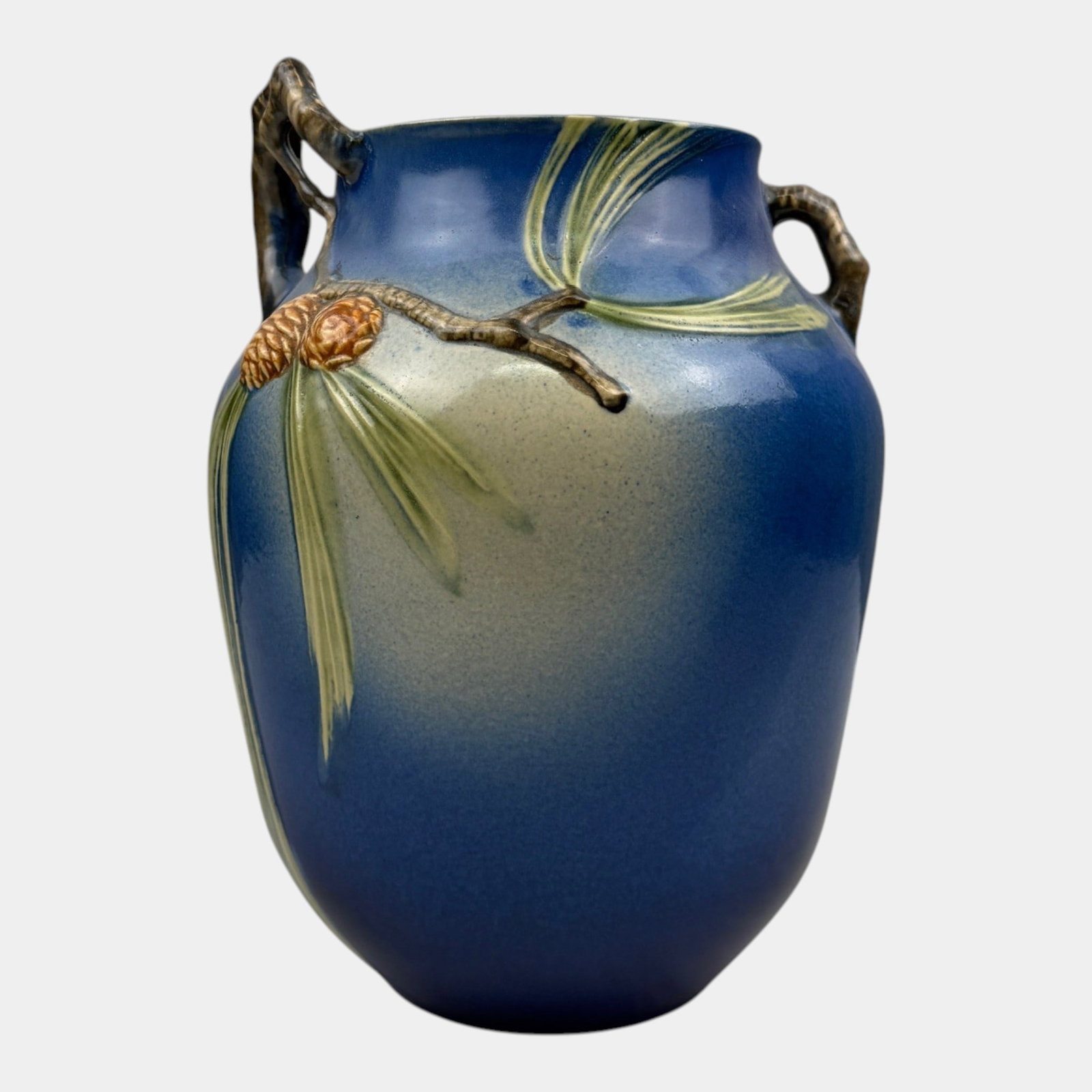 Roseville Pine Cone Blue 1936 Vintage Art Deco Pottery Ceramic Vase 711-10: Professional, fast, and affordable in house shipping available for all items. For higher resolution images please visit bid.craftedauctions.com Roseville Pine Cone Blue 1936 Vintage Art Deco Pottery C