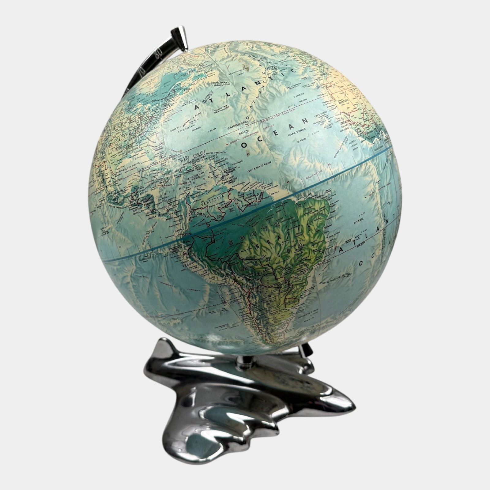 Rand McNally World Portrait Globe With Art Deco Chrome Airplane Base & Chrome Arm: Professional, fast, and affordable in house shipping available for all items. For higher resolution images please visit bid.craftedauctions.com Rand McNally World Portrait Globe With Art Deco Chrome A
