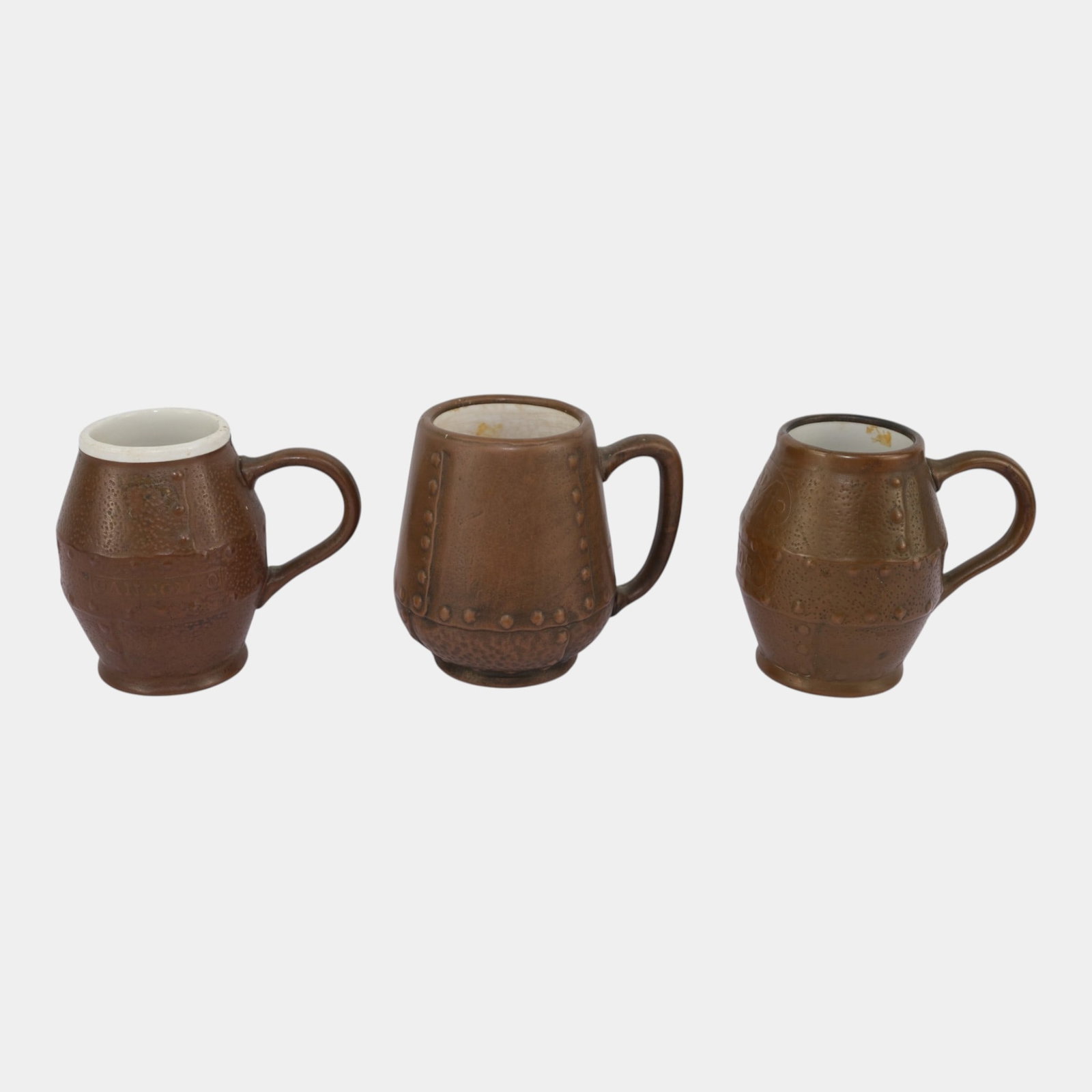 Clewell Copper Clad Vintage Art And Crafts Pottery Brown Ceramic Rivet Pattern Mugs: Professional, fast, and affordable in house shipping available for all items. For higher resolution images please visit bid.craftedauctions.com Clewell Copper Clad Vintage Art And Crafts Pottery Brown
