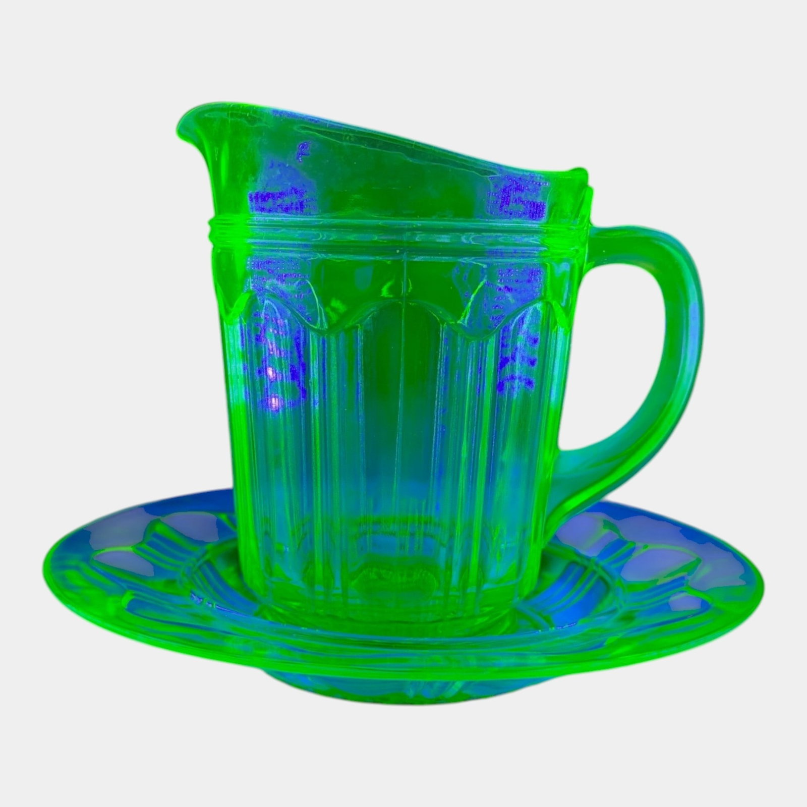 Anchor Hocking 1930s Art Deco Green Uranium Glass "Colonial" Pitcher And Dish: Professional, fast, and affordable in house shipping available for all items. For higher resolution images please visit bid.craftedauctions.com Anchor Hocking 1930s Art Deco Green Uranium Glass "Colon