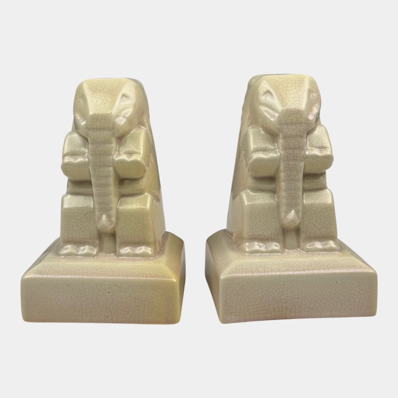Margaret Postgate For Cowan Pottery 1930 Art Deco Upright Ivory Glazed Elephant Bookends: Professional, fast, and affordable in house shipping available for all items. For higher resolution images please visit bid.craftedauctions.com Margaret Postgate For Cowan Pottery 1930 Art Deco Uprigh