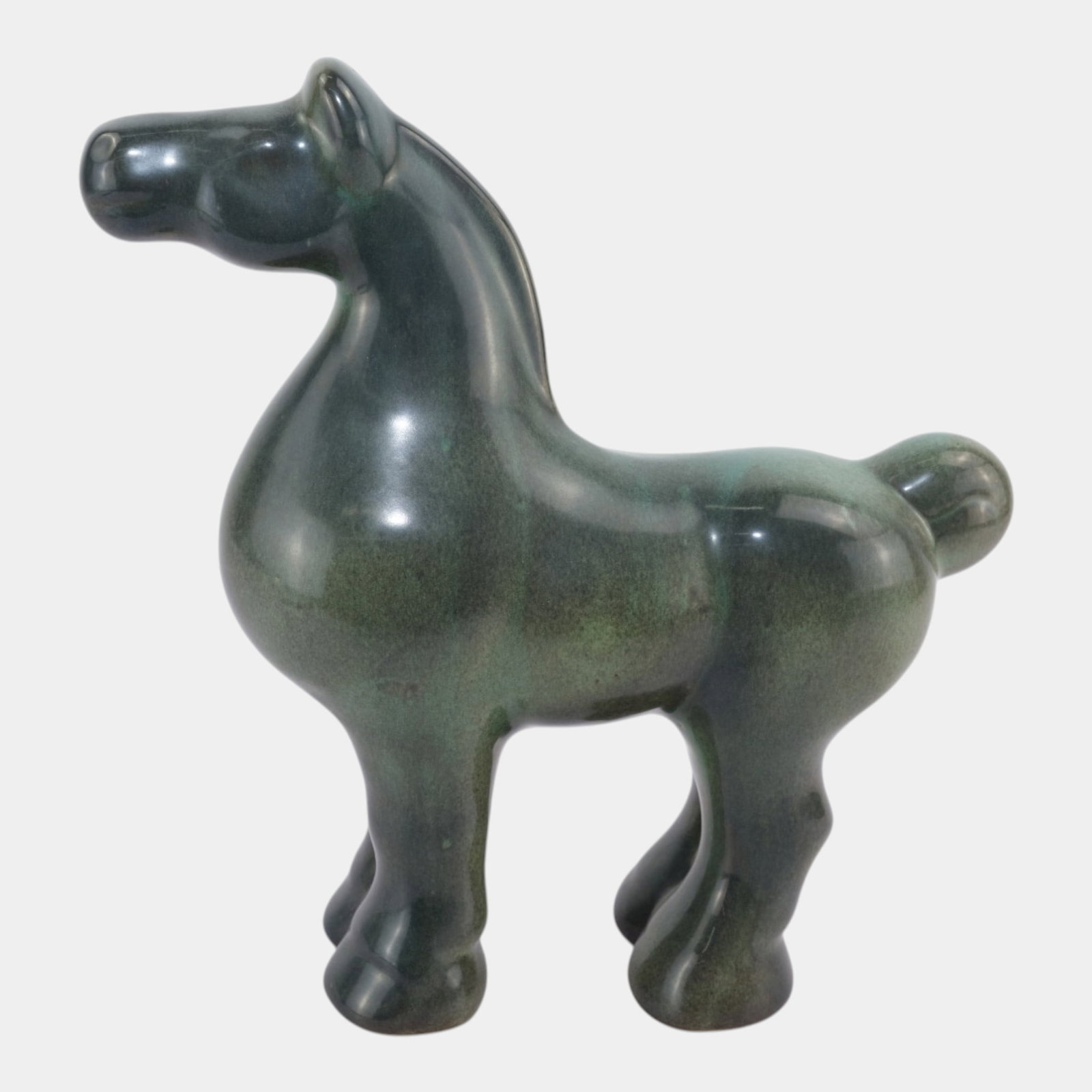 Shearwater Pottery Glossy Green "Chesty" Horse Figural Art Pottery Sculpture Figurine: Professional, fast, and affordable in house shipping available for all items. For higher resolution images please visit bid.craftedauctions.com Shearwater Pottery Glossy Green "Chesty" Horse Figural A