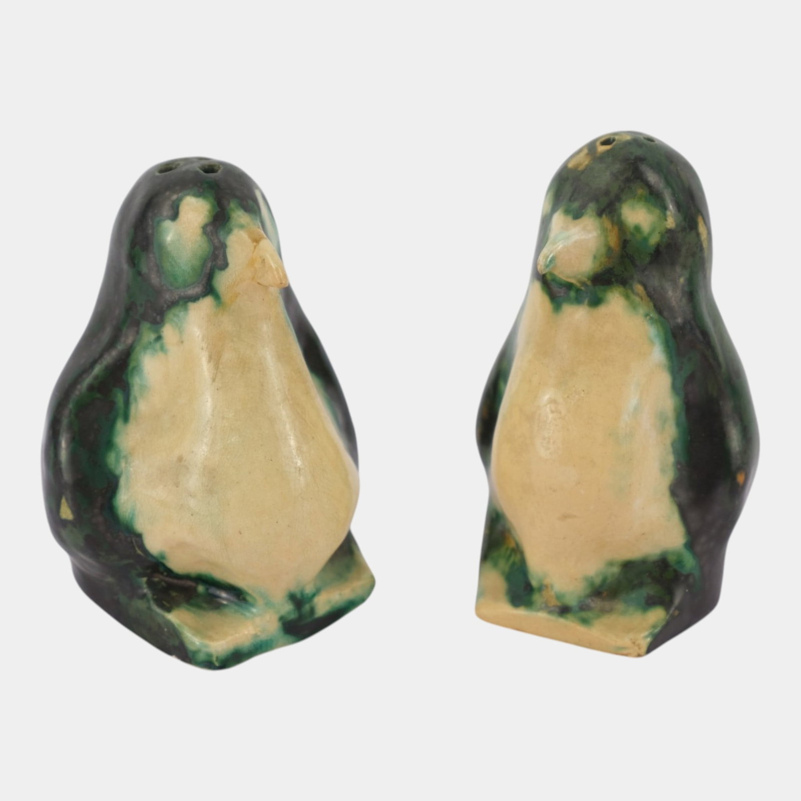 Early 20th Century Arts & Crafts Green Cream Glazed Figural Penguin Art Pottery Salt & Pepper: Professional, fast, and affordable in house shipping available for all items. For higher resolution images please visit bid.craftedauctions.com Early 20th Century Arts & Crafts Green Cream Glazed Figu