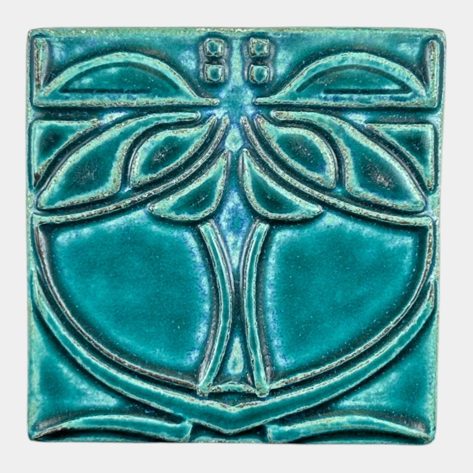 Motawi Tileworks Contemporary Art Pottery Mottled Green Stylized Tree Tile: Professional, fast, and affordable in house shipping available for all items. For higher resolution images please visit bid.craftedauctions.com Motawi Tileworks Contemporary Art Pottery Mottled Green 