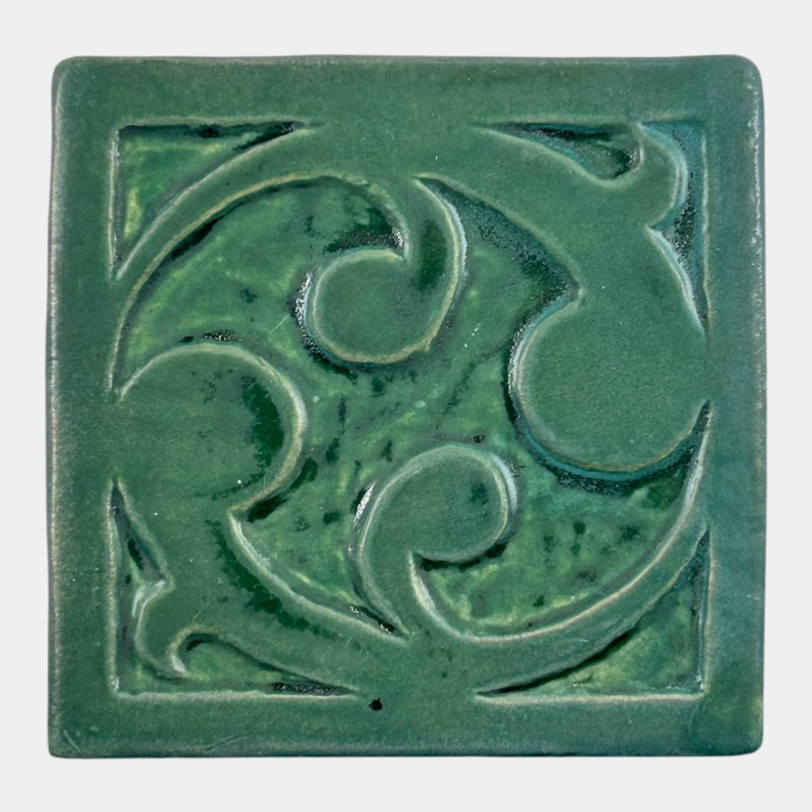 Avery Pottery & Tileworks Contemporary Arts And Crafts Green Scroll Relief Ceramic Art Tile: Professional, fast, and affordable in house shipping available for all items. For higher resolution images please visit bid.craftedauctions.com Avery Pottery & Tileworks Contemporary Arts And Crafts G