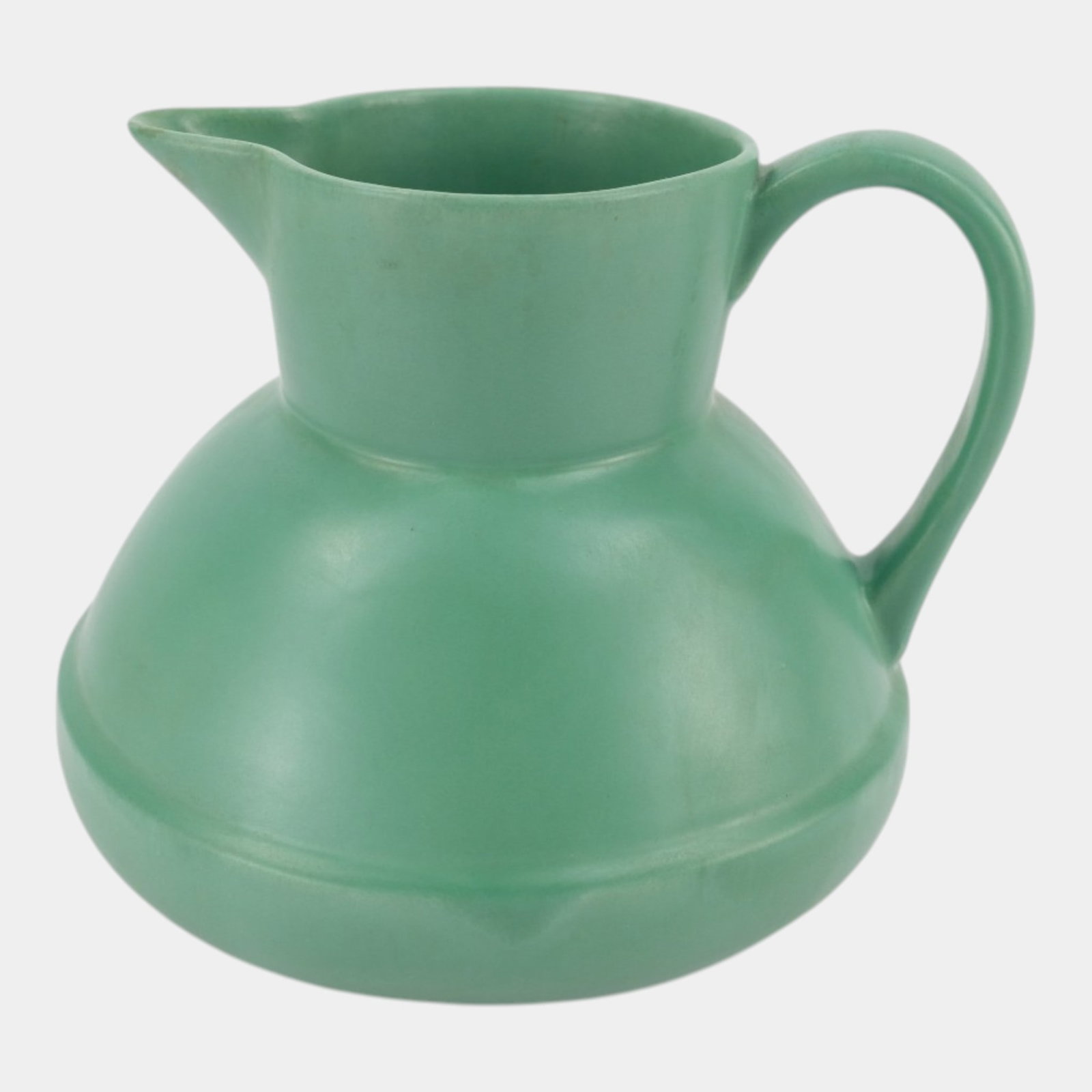 Catalina Island California Art Deco Matte Green Art Pottery Handled Water Pitcher Jug Ceramic: Professional, fast, and affordable in house shipping available for all items. For higher resolution images please visit bid.craftedauctions.com Catalina Island California Art Deco Matte Green Art Pott