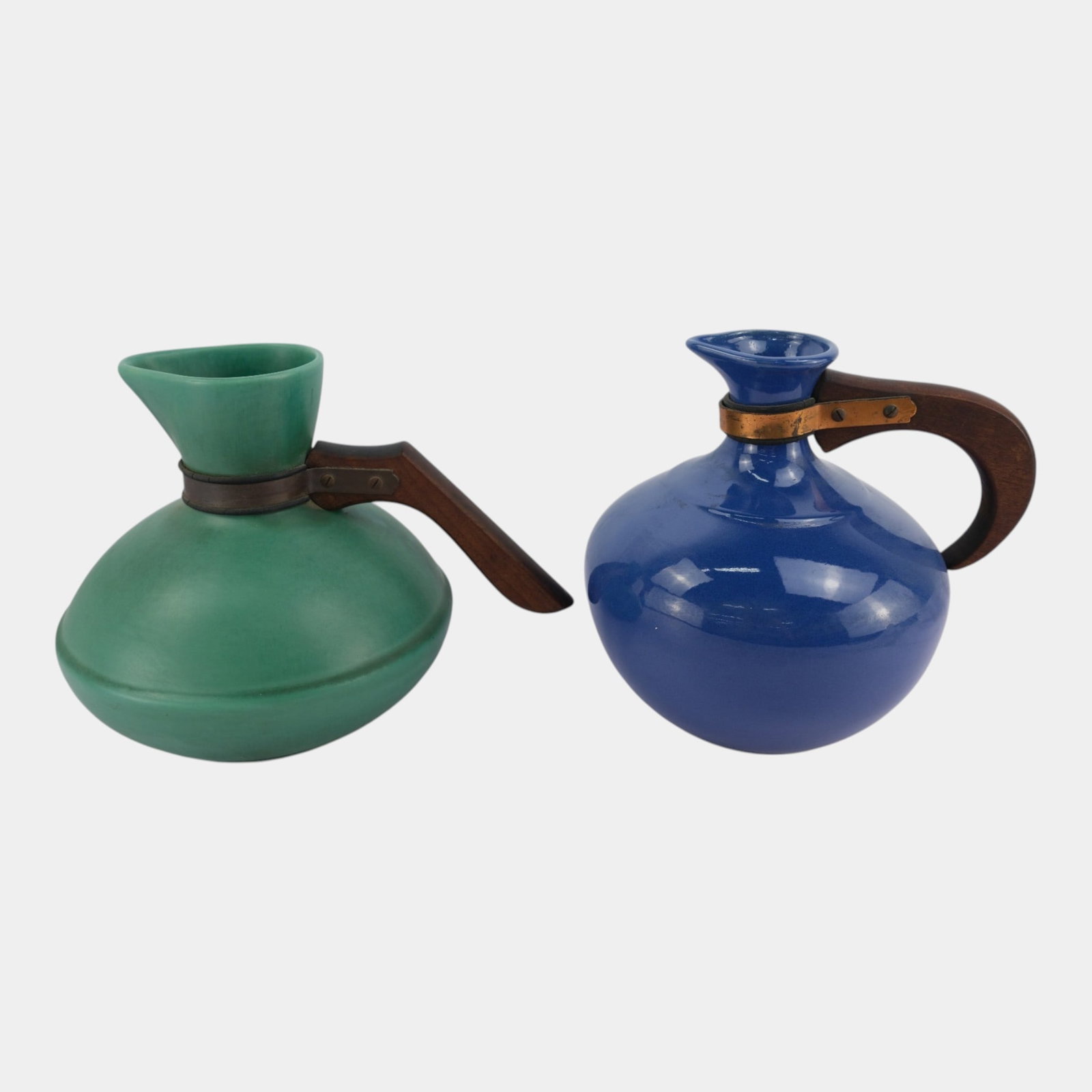 Catalina Island & Bauer Los Angeles Matte Green & Glossy Blue Art Deco Water Pitchers: Professional, fast, and affordable in house shipping available for all items. For higher resolution images please visit bid.craftedauctions.com Catalina Island & Bauer Los Angeles Matte Green & Glossy