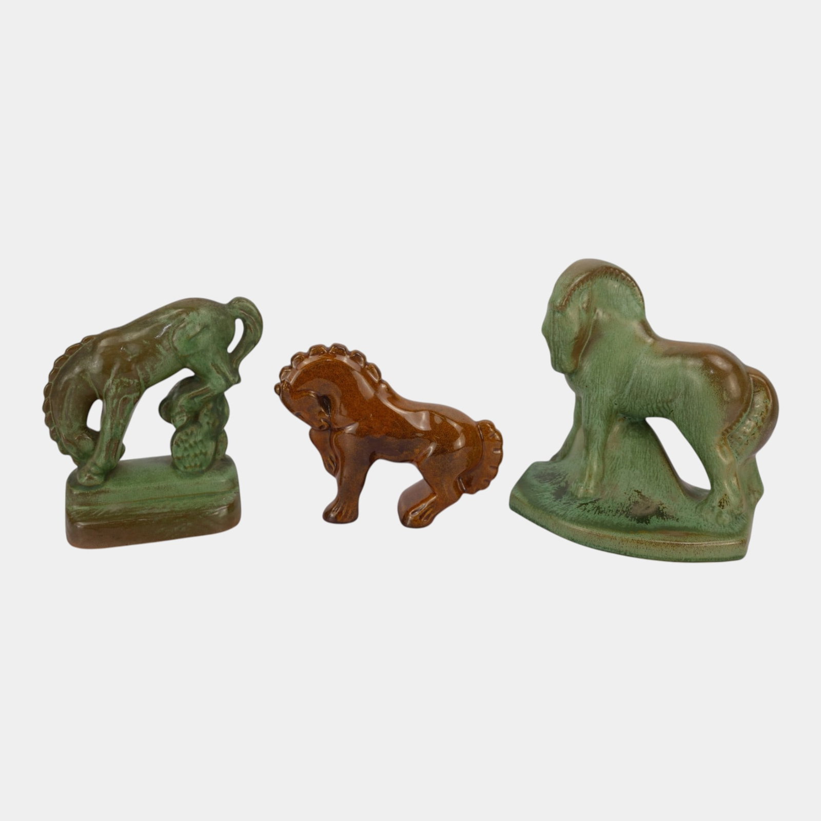 Frankoma Pottery Mid Century Modern Green & Brown Figural Horse Ceramic Sculptures Collection: Professional, fast, and affordable in house shipping available for all items. For higher resolution images please visit bid.craftedauctions.com Frankoma Pottery Mid Century Modern Green & Brown Figura
