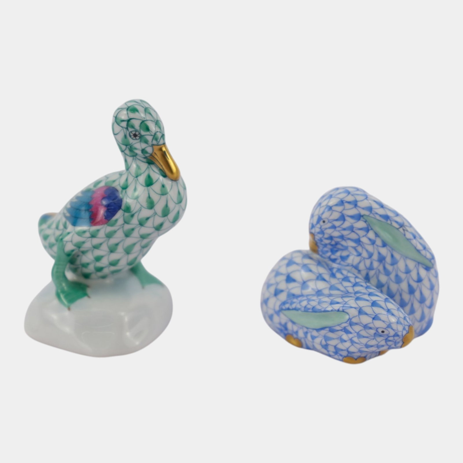Herend Hungary Hand Painted Fishnet Porcelain Blue Green Duck & Rabbits Figurines: Professional, fast, and affordable in house shipping available for all items. For higher resolution images please visit bid.craftedauctions.com Herend Hungary Hand Painted Fishnet Porcelain Blue Green