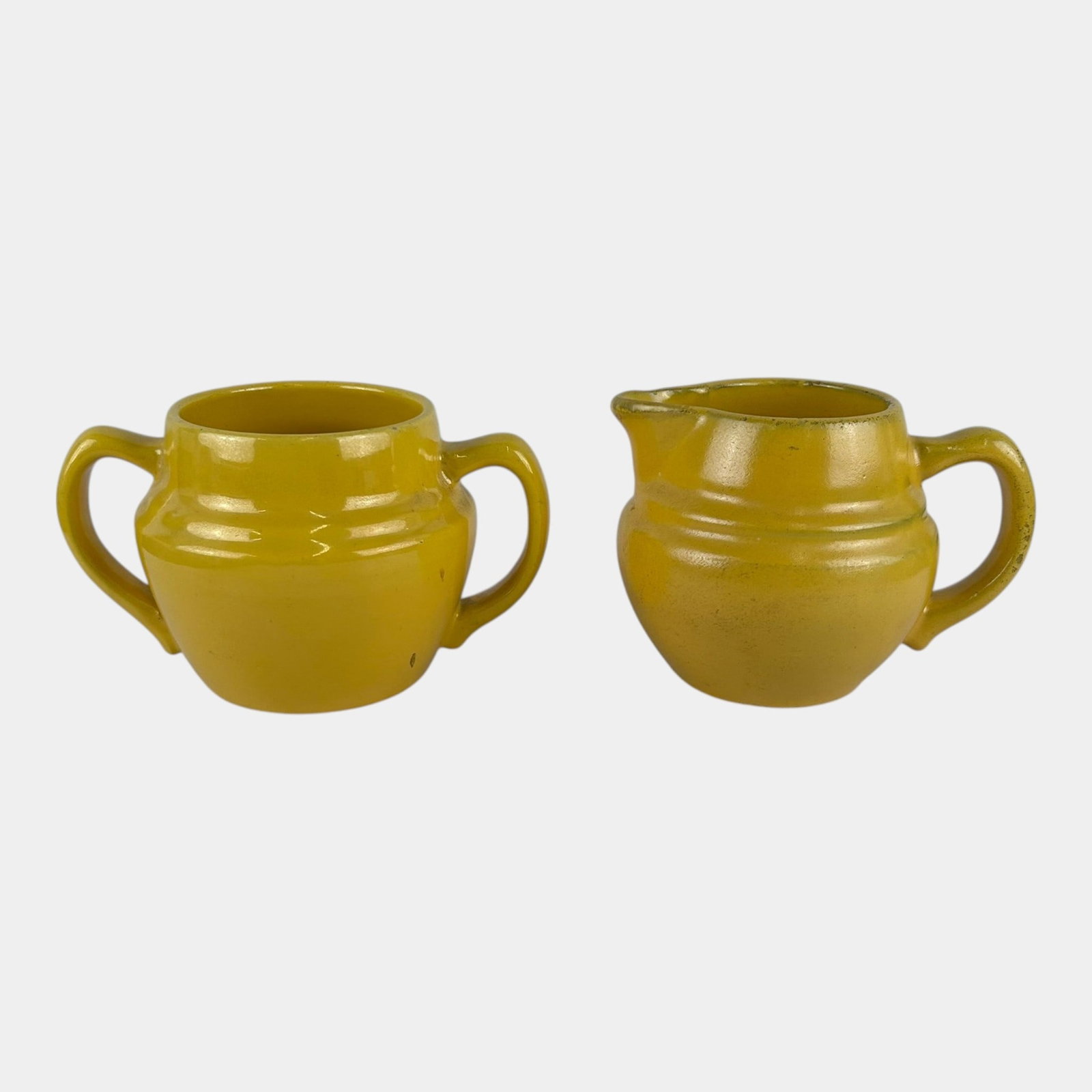Catalina Island California Pottery 1930s Yellow Art Deco Creamer & Double Handled Sugar Bowl: Professional, fast, and affordable in house shipping available for all items. For higher resolution images please visit bid.craftedauctions.com Catalina Island California Pottery 1930s Yellow Art Deco