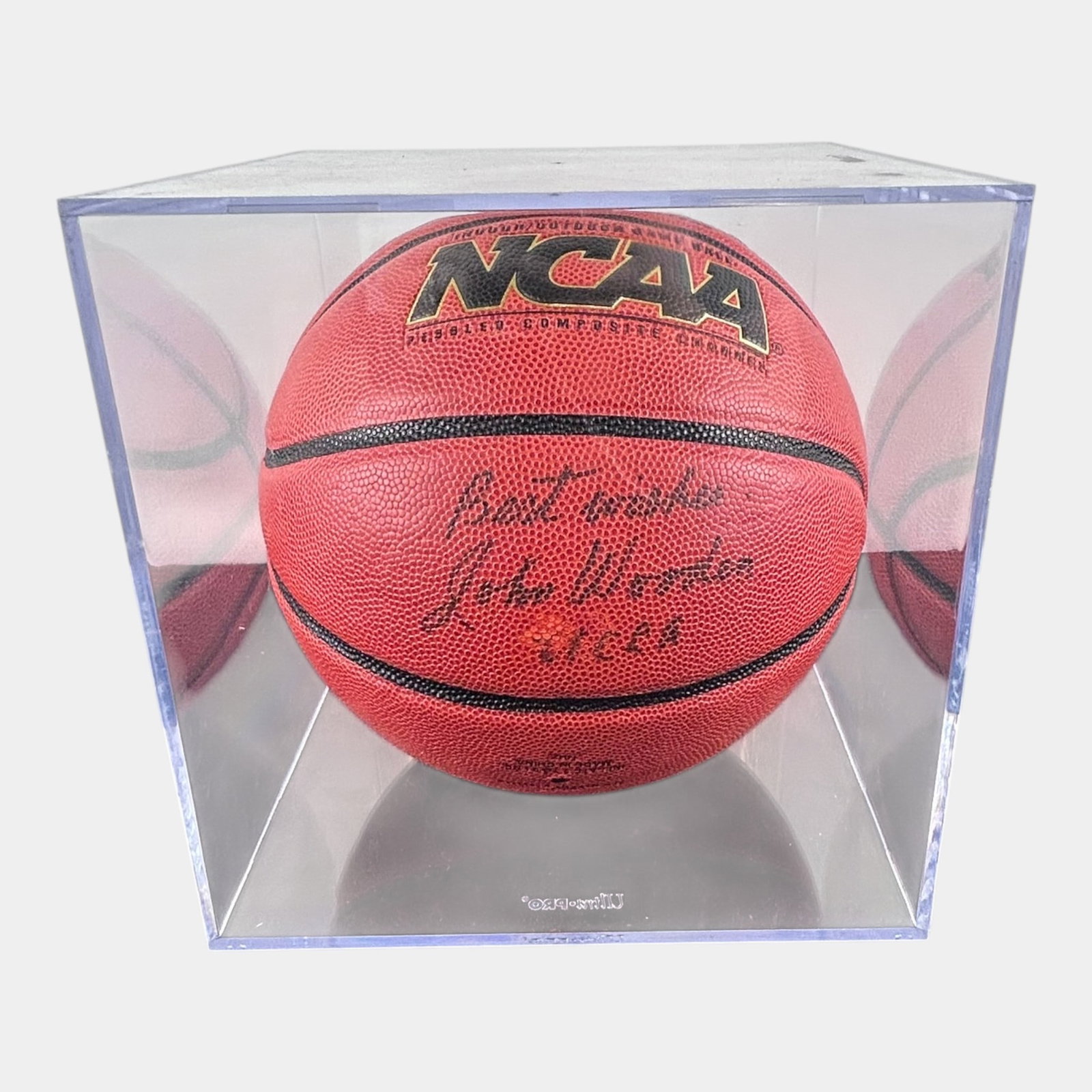 John Wooden Autographed NCAA Basketball In Display Case Signed UCLA Hall Of Fame Coach: Professional, fast, and affordable in house shipping available for all items. For higher resolution images please visit bid.craftedauctions.com John Wooden Autographed NCAA Basketball In Display Case 