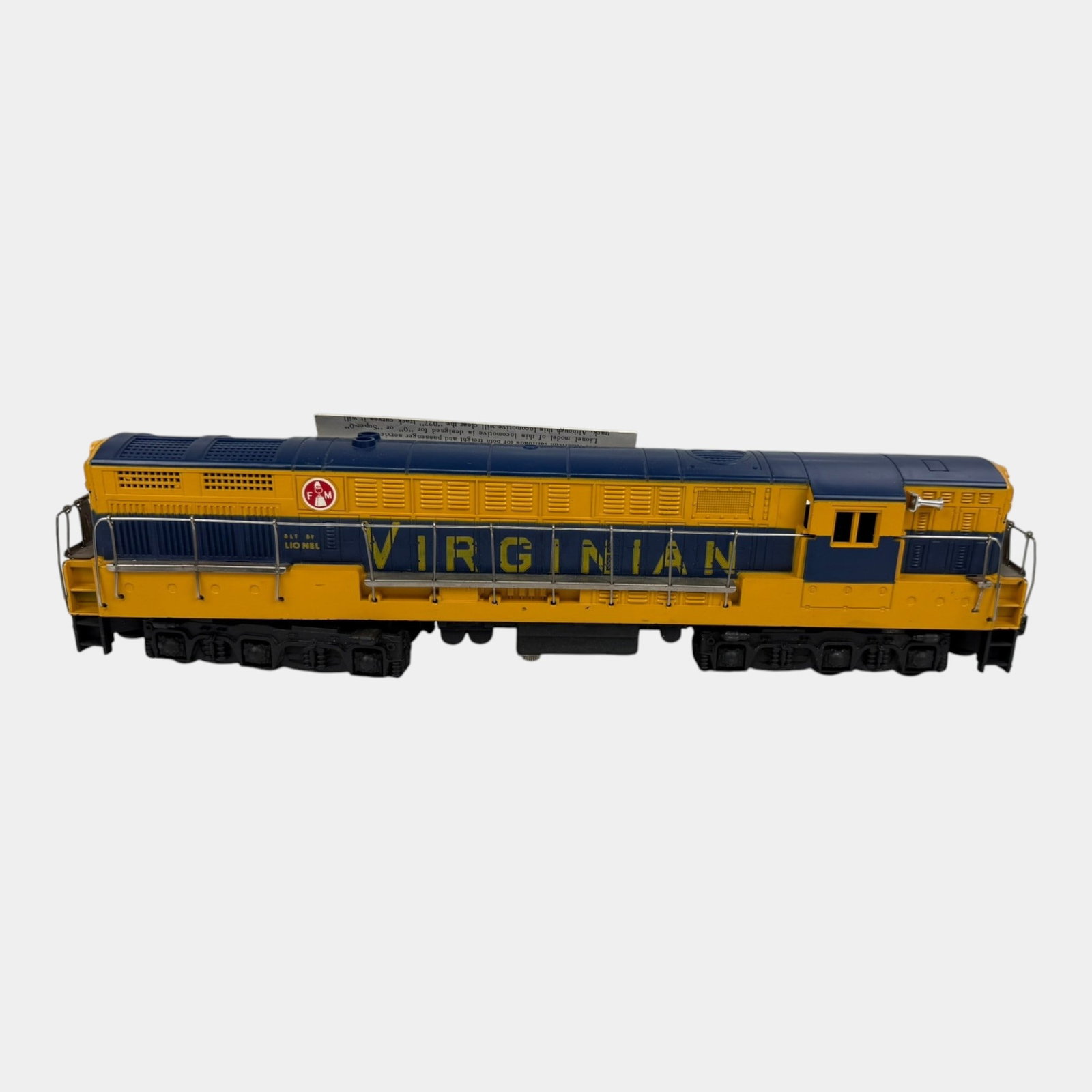Lionel Trains Post War Yellow Blue Virginian FM Train Master Locomotive Engine 2322: Professional, fast, and affordable in house shipping available for all items. For higher resolution images please visit bid.craftedauctions.com Lionel Trains Post War Yellow Blue Virginian FM Train Ma