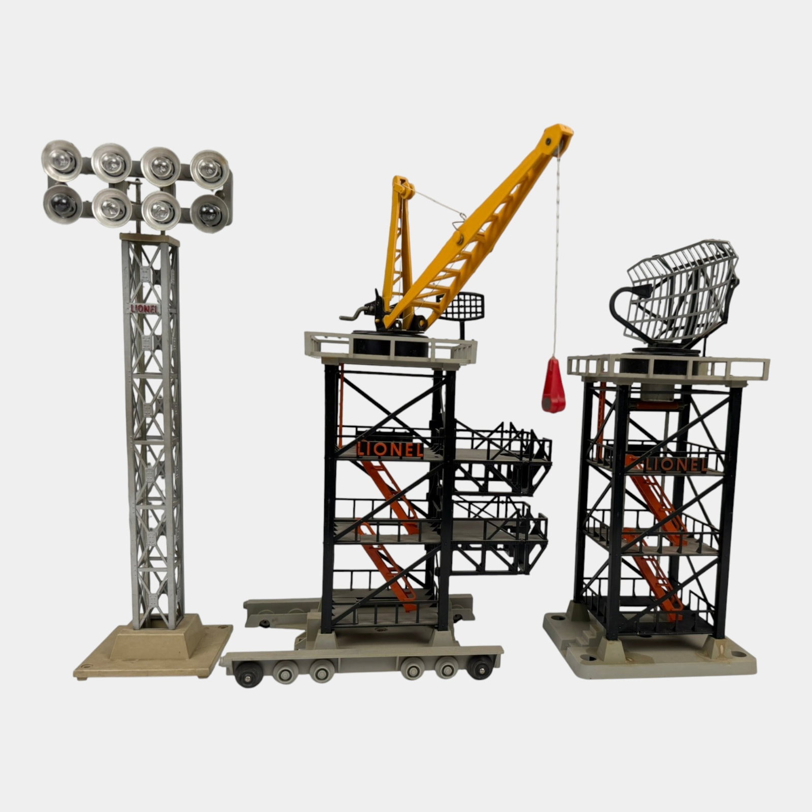 Lionel Trains Post War Floodlight Tower 195, Rocket Launcher 175, & Radar Tower 197 Accessories: Professional, fast, and affordable in house shipping available for all items. For higher resolution images please visit bid.craftedauctions.com Lionel Trains Post War Floodlight Tower 195, Rocket Laun