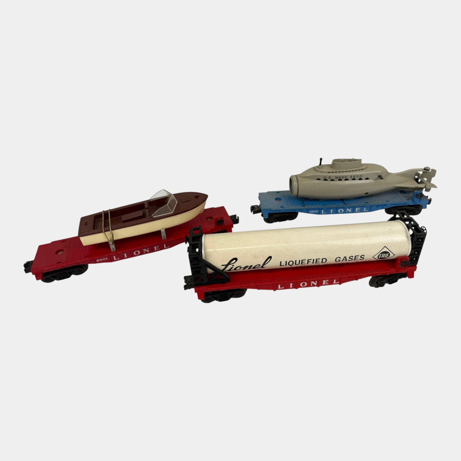Lionel Trains Post War Red Lionel Boat Flatbed 6801, Submarine Flatbed 3830, Gas Flatbed 6469 Cars (1 of 4)