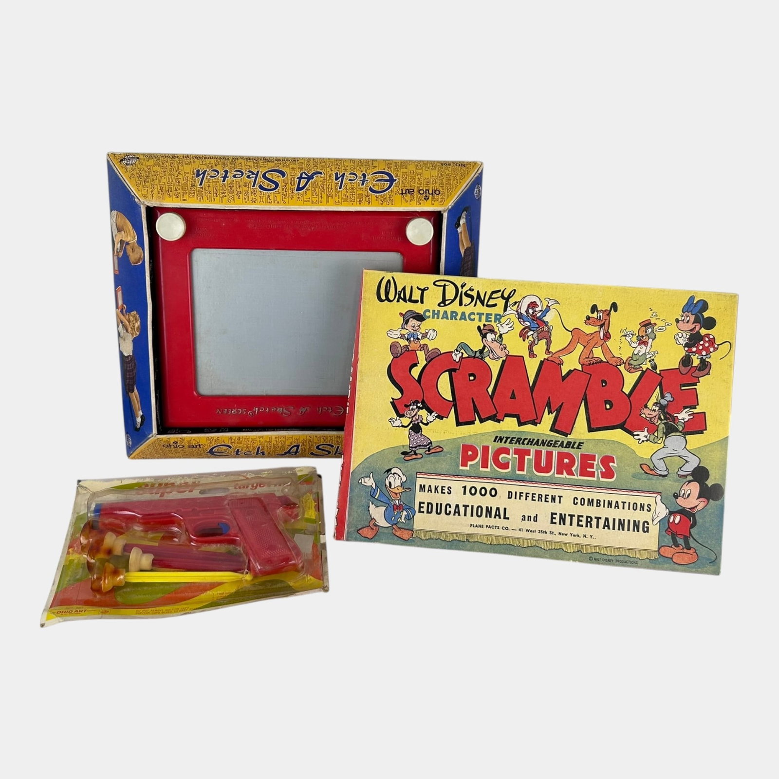 Ohio Art Super Target Master, Etch A Sketch, & Walt Disney Scramble Vintage Toys: Professional, fast, and affordable in house shipping available for all items. For higher resolution images please visit bid.craftedauctions.com Ohio Art Super Target Master, Etch A Sketch, & Walt Disn