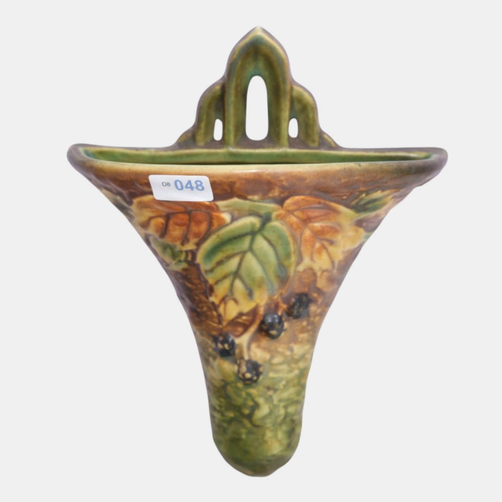 Roseville Blackberry 1932 Vintage Arts And Crafts Pottery Wall Pocket 1267-8: Professional, fast, and affordable in house shipping available for all items. For higher resolution images please visit bid.craftedauctions.com Roseville Blackberry 1932 Vintage Arts And Crafts Potter