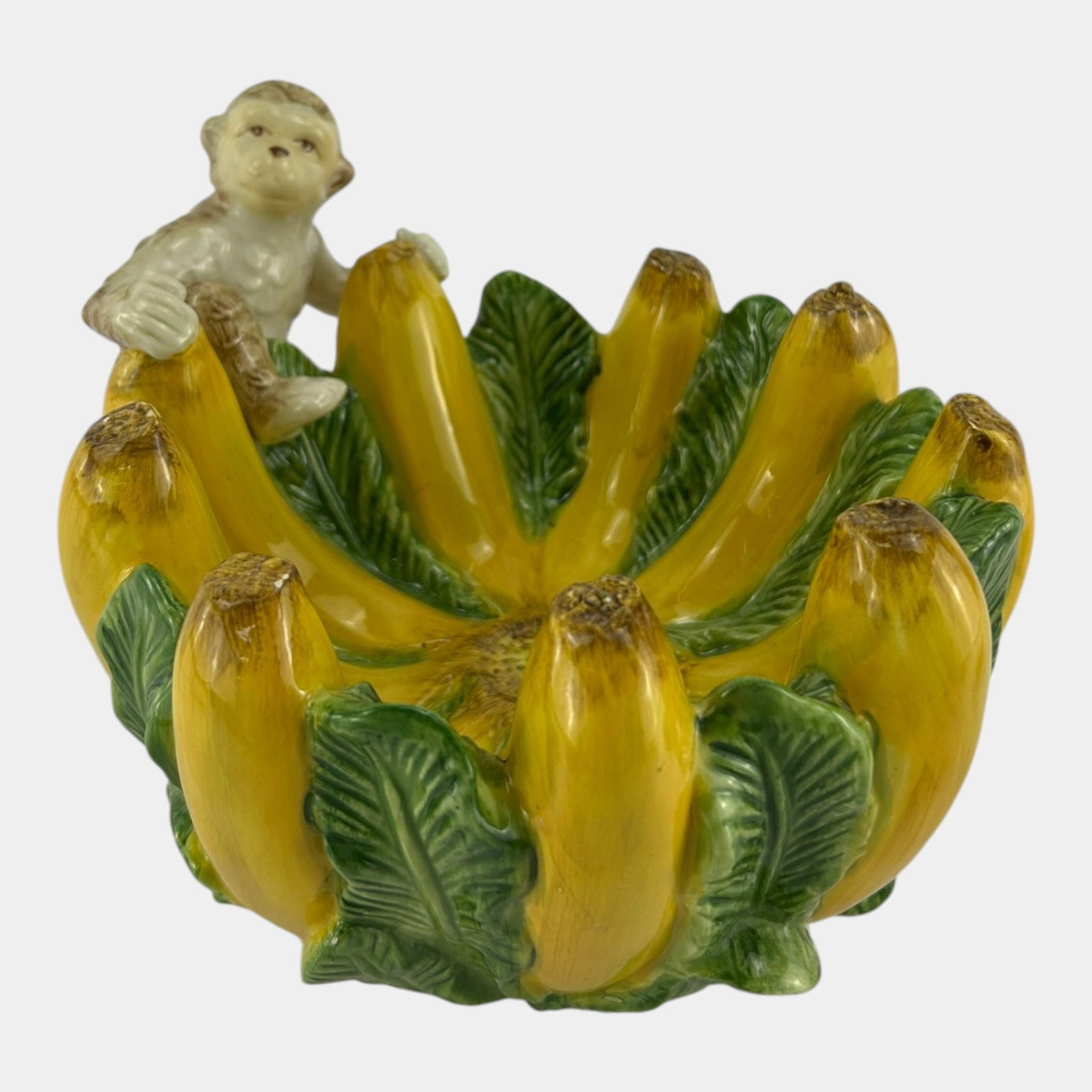 Kaldun & Bogle Green Yellow Glazed Figural Monkey On Banana And Leaf Bowl: Professional, fast, and affordable in house shipping available for all items. For higher resolution images please visit bid.craftedauctions.com Kaldun & Bogle Green Yellow Glazed Figural Monkey On Ban
