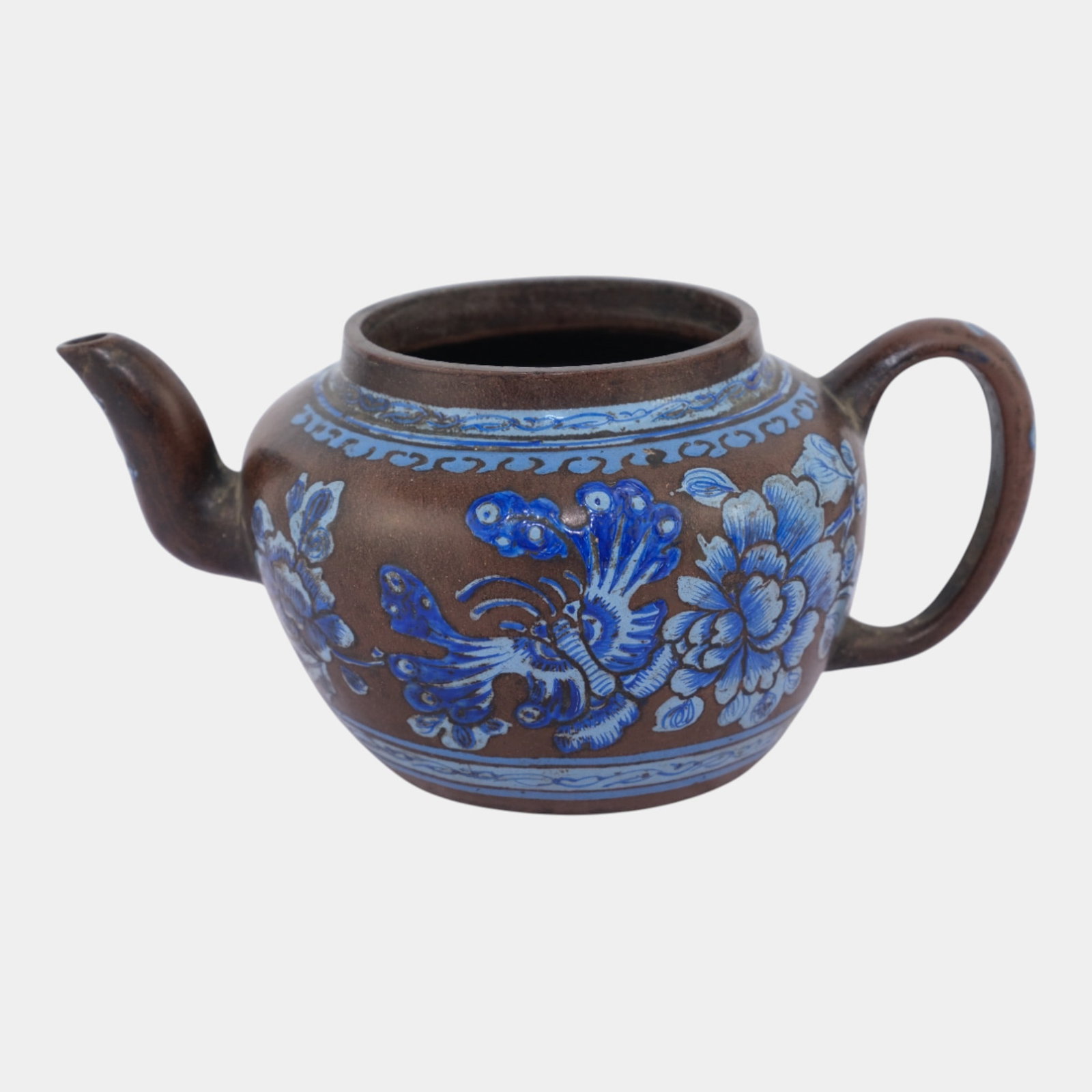 19th Century Qing Period Yixing Blue Enameled Floral Butterfly Brownware Teapot: Professional, fast, and affordable in house shipping available for all items. For higher resolution images please visit bid.craftedauctions.com 19th Century Qing Period Yixing Blue Enameled Floral But