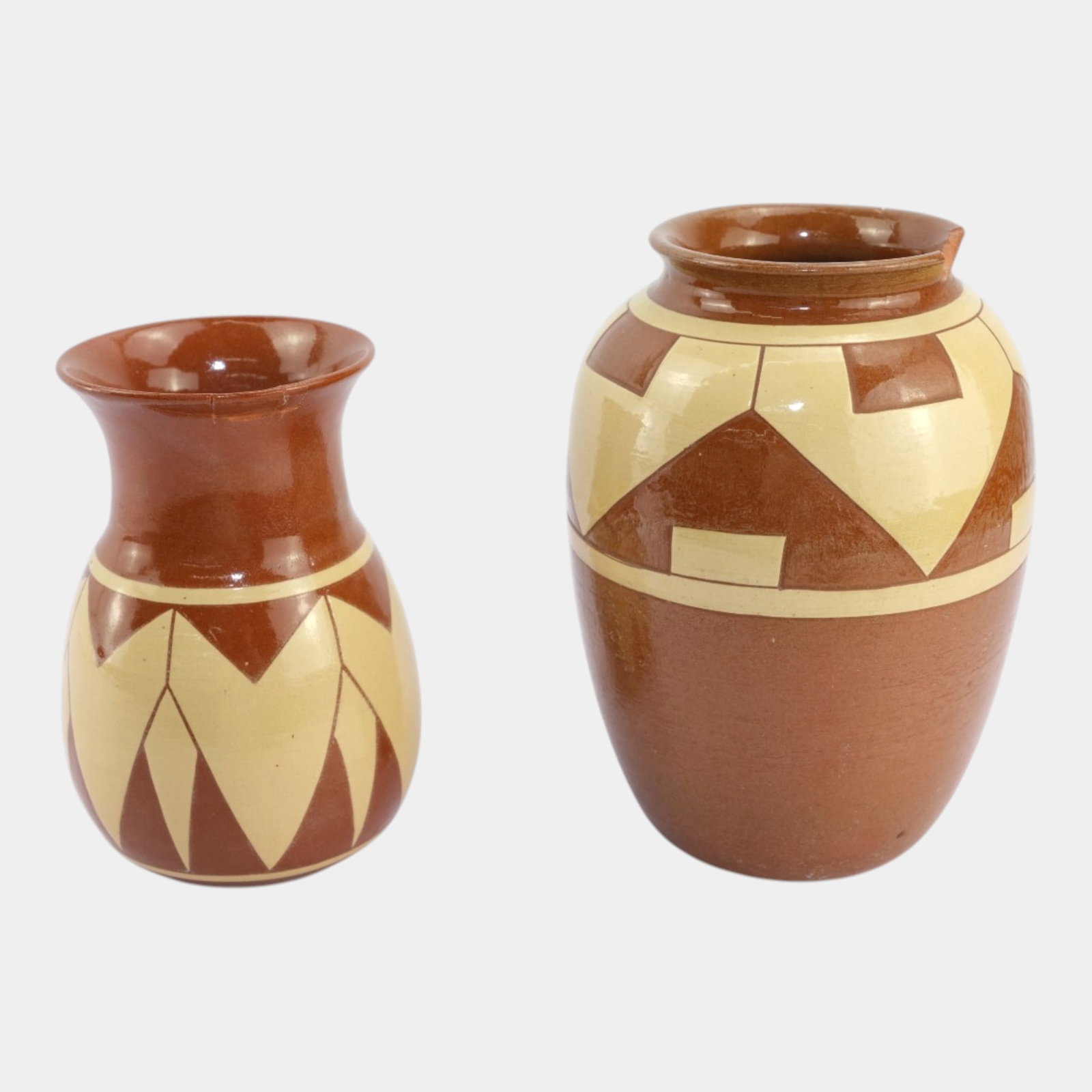 Pair of Large Pine Ridge Vases: Professional, fast, and affordable in house shipping available for all items. For higher resolution images please visit bid.craftedauctions.com Pair of Large Pine Ridge Vases Taller vase has a broken 