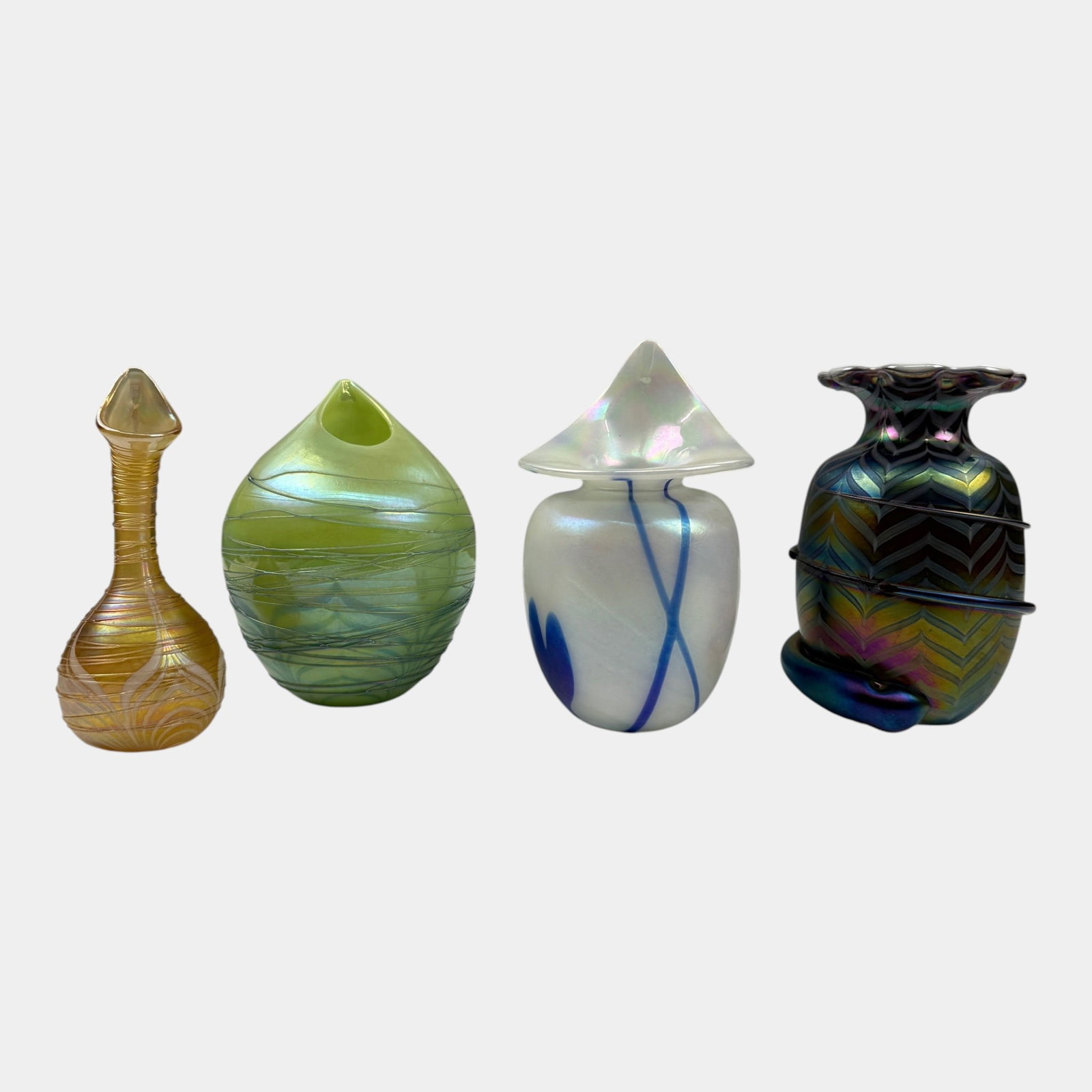 Terry Crider Ohio Studio Art Glass Pulled Feather, Uranium Glass Threaded, & Heart & Vine Vases: Professional, fast, and affordable in house shipping available for all items. For higher resolution images please visit bid.craftedauctions.com Terry Crider Ohio Studio Art Glass Pulled Feather, Urani