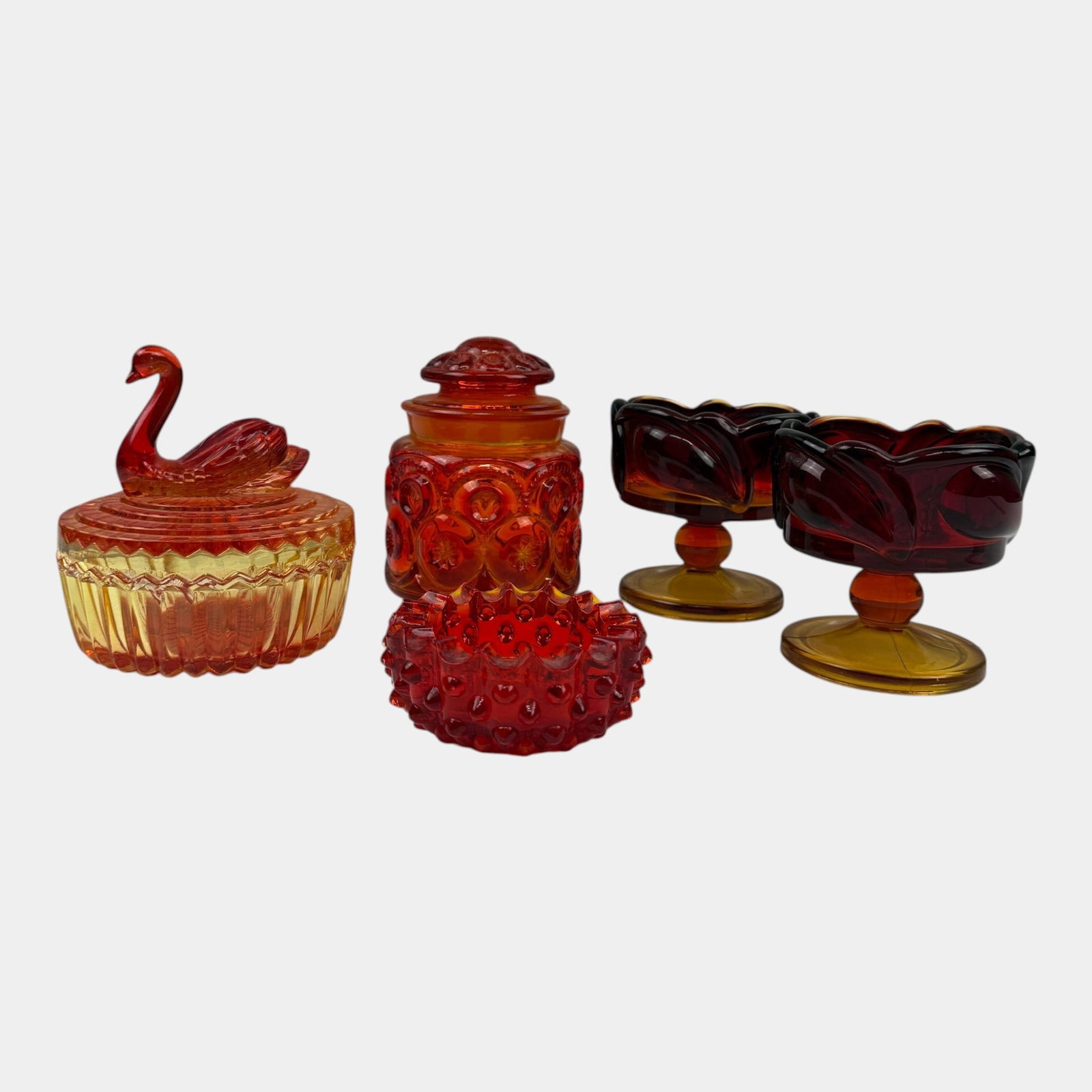 Jeanette Glass, L.E. Smith, Indiana Glass, & Fenton Red Glass Hobnail Moon & Stars Jars, Candle: Professional, fast, and affordable in house shipping available for all items. For higher resolution images please visit bid.craftedauctions.com Jeanette Glass, L.E. Smith, Indiana Glass, & Fenton Red 