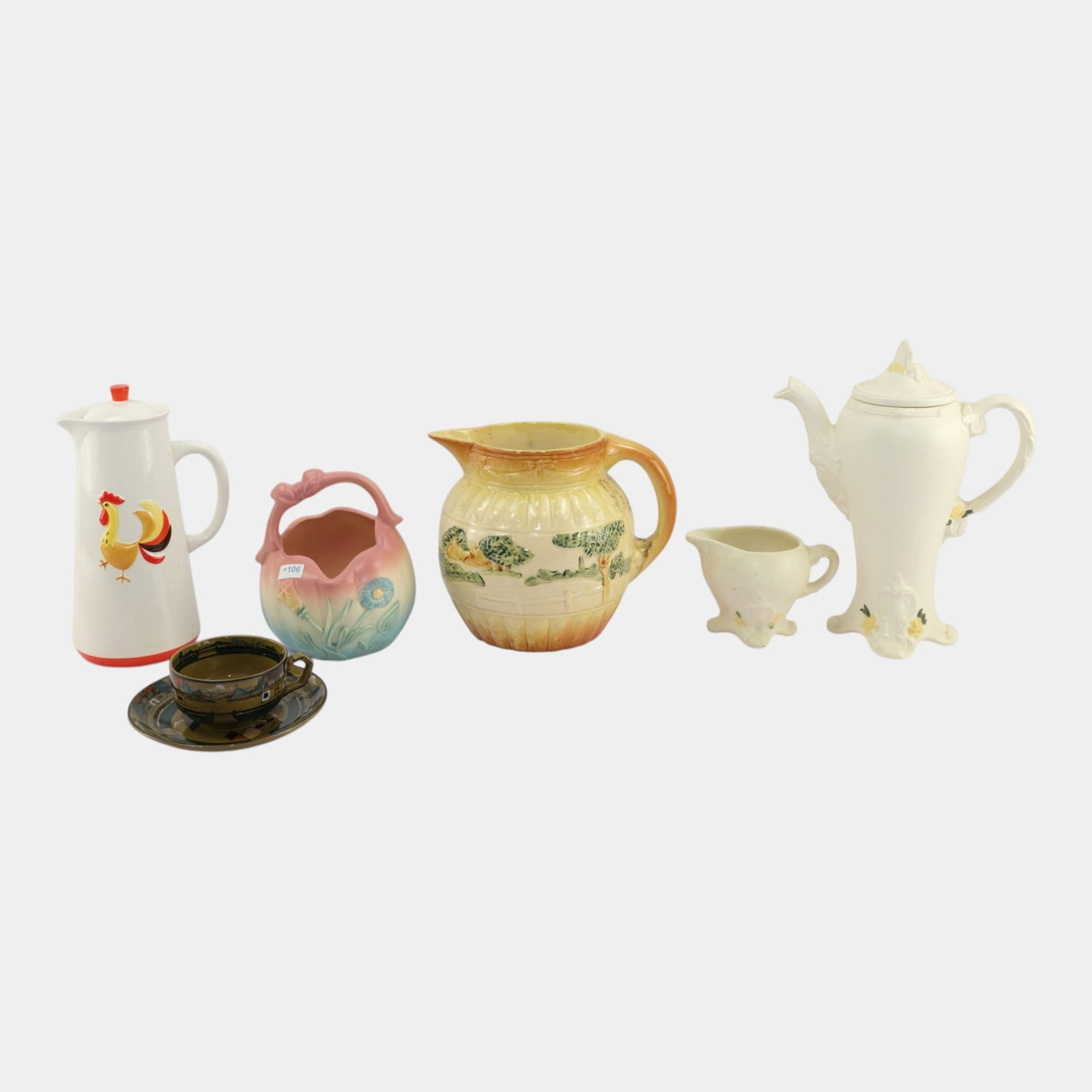 Hull, Buffalo Deldare, Holt Howard, & Other Art Pottery Basket Pitcher Teacup Pitchers: Professional, fast, and affordable in house shipping available for all items. For higher resolution images please visit bid.craftedauctions.com Hull, Buffalo Deldare, Holt Howard, & Other Art Pottery 